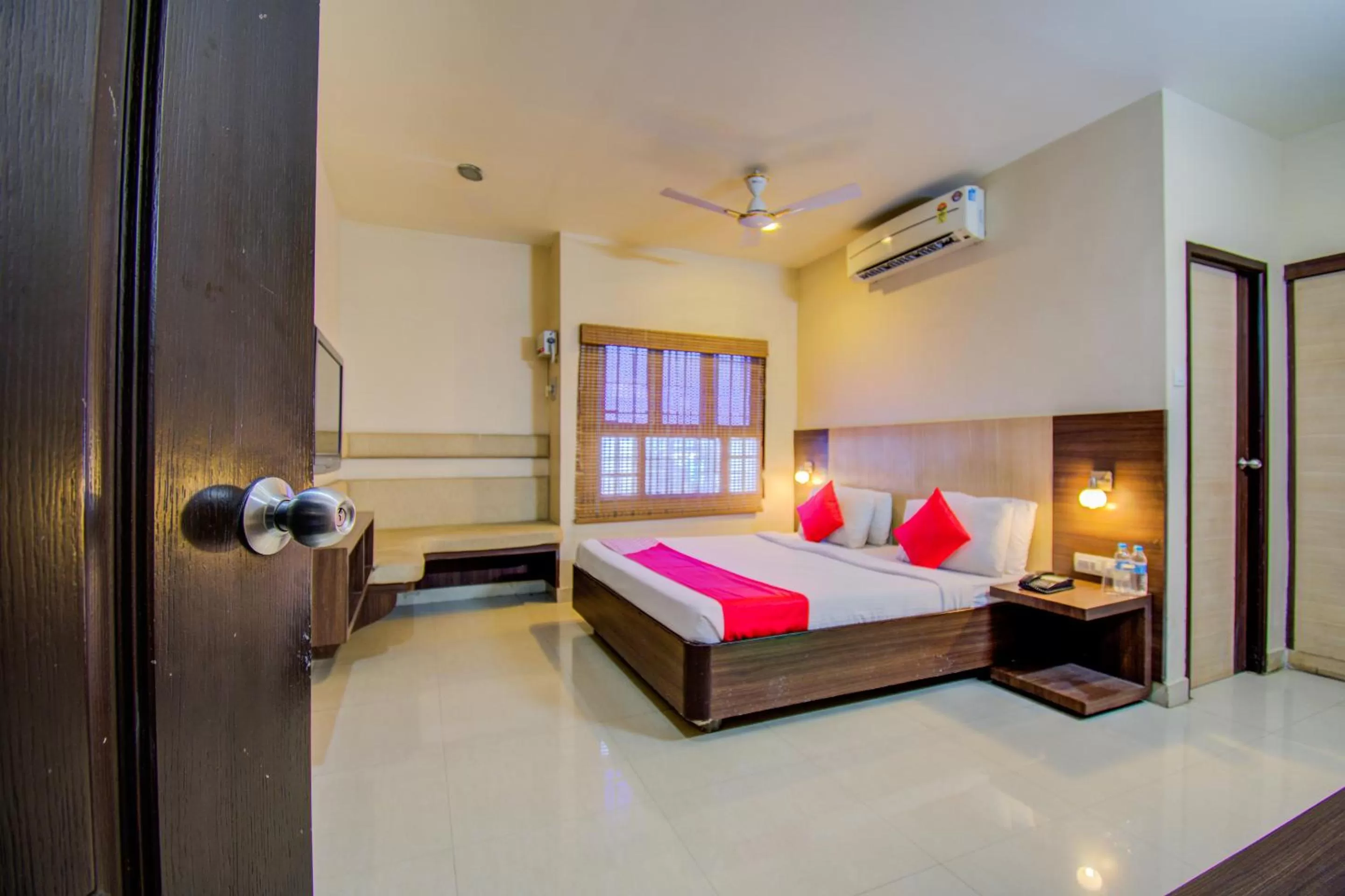 Photo of the whole room, Bed in Sivamurugan Hotels