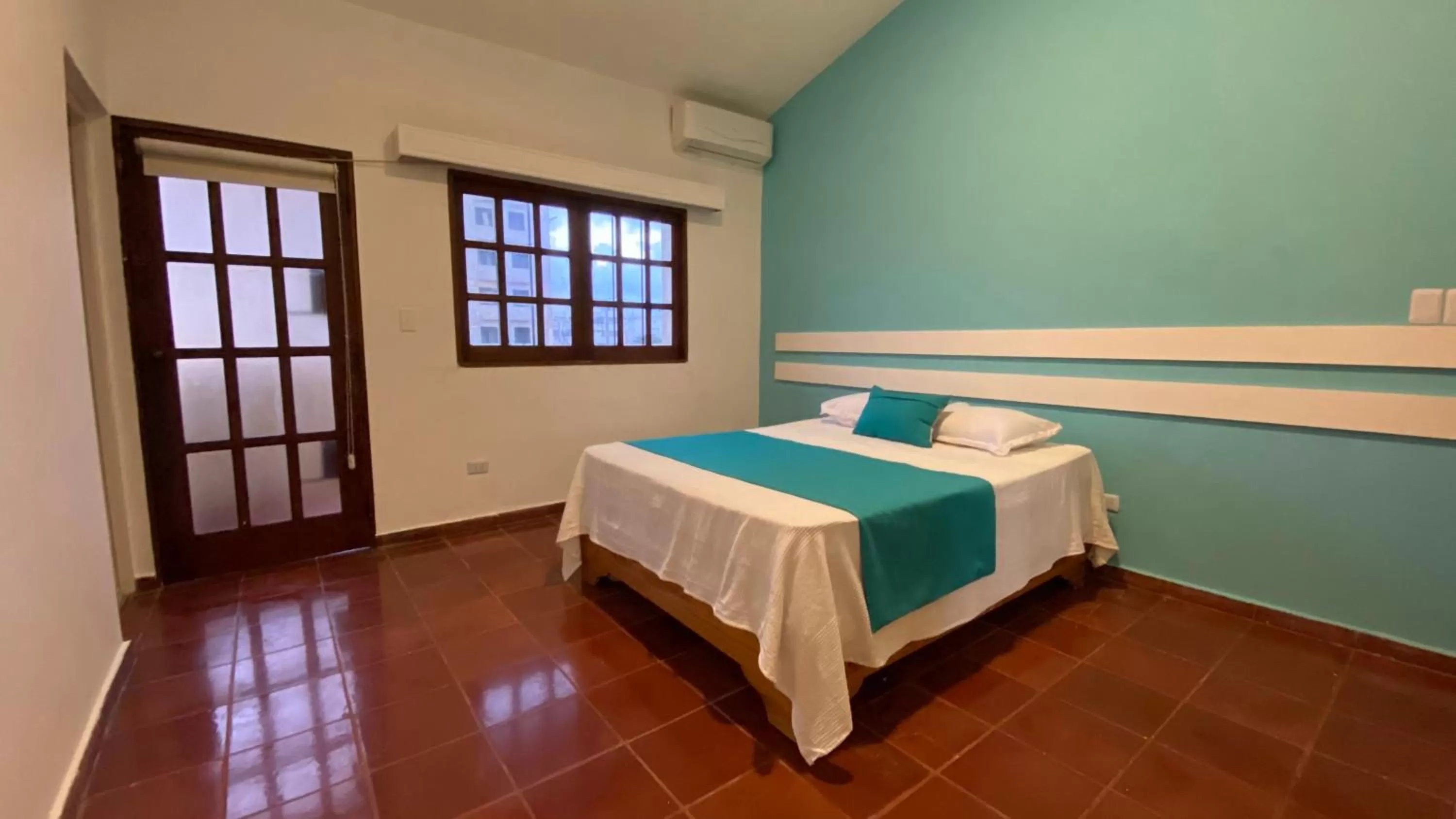 Bed in Calypso Beach Hotel by The Urbn House Santo Domingo Airport