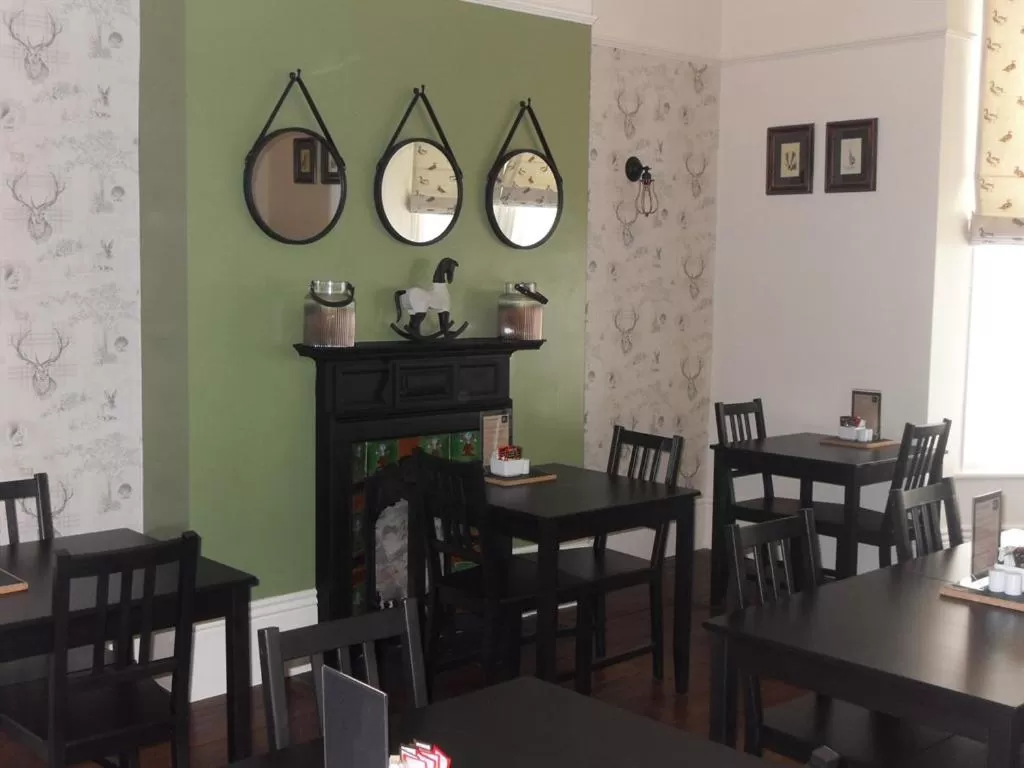 Dining area in Powys Lodge