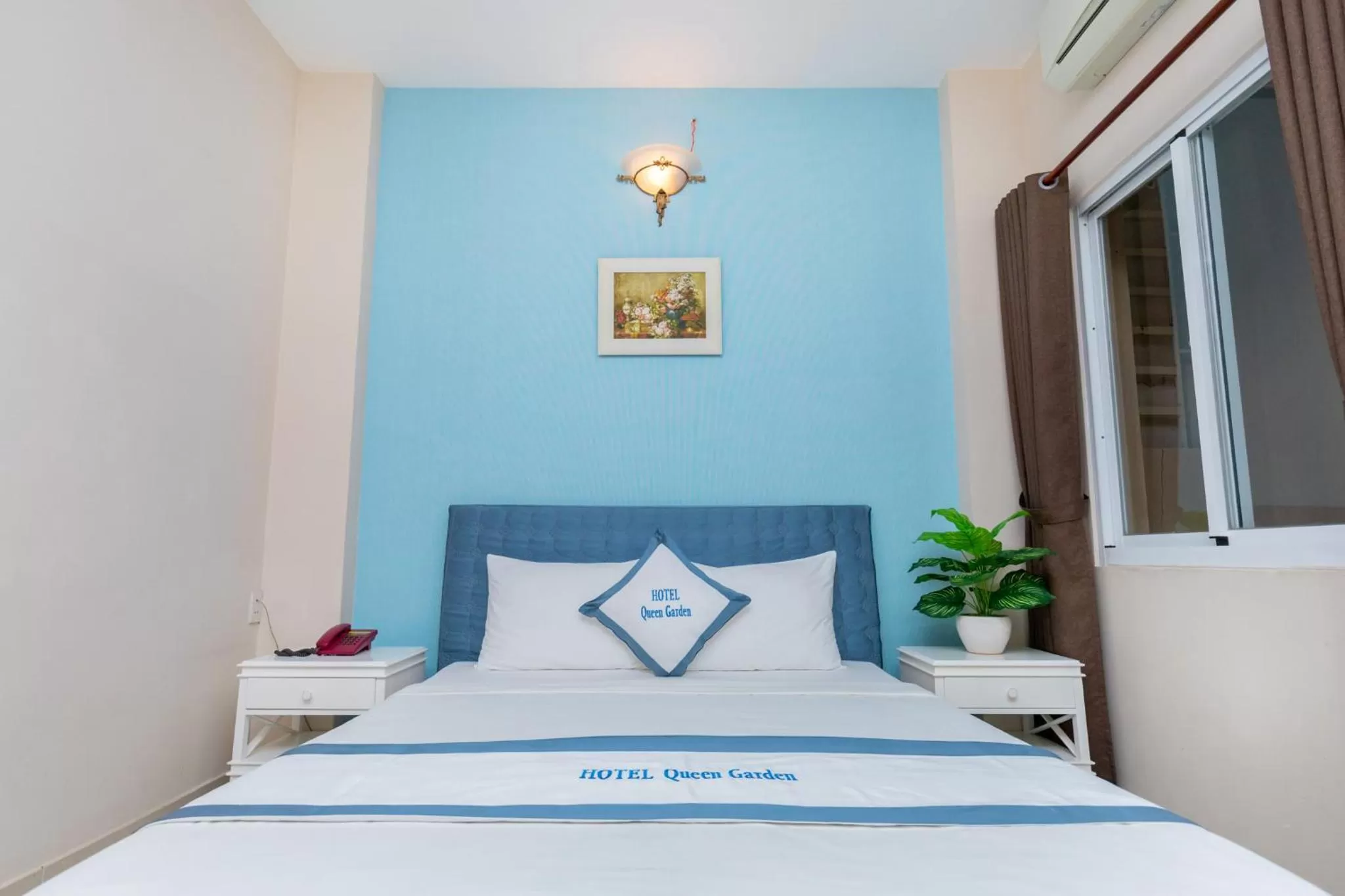 Bed in Queen Garden Hotel & Apartment