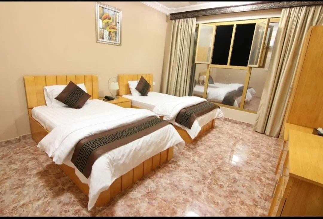 Bed in DREAMLAND HOTEL APARTMENT NIZWA