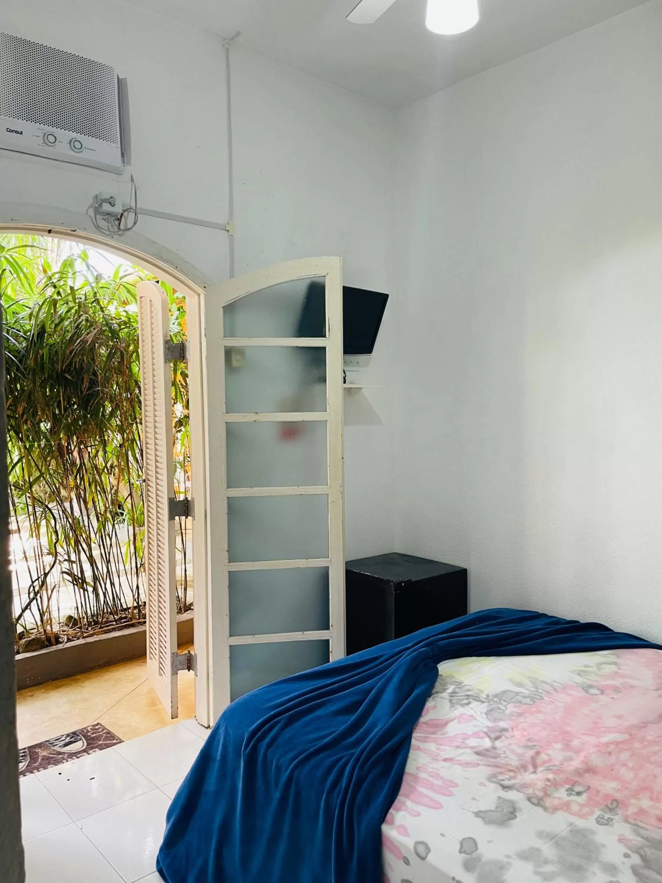 Bed in Pousada Praia do Tombo