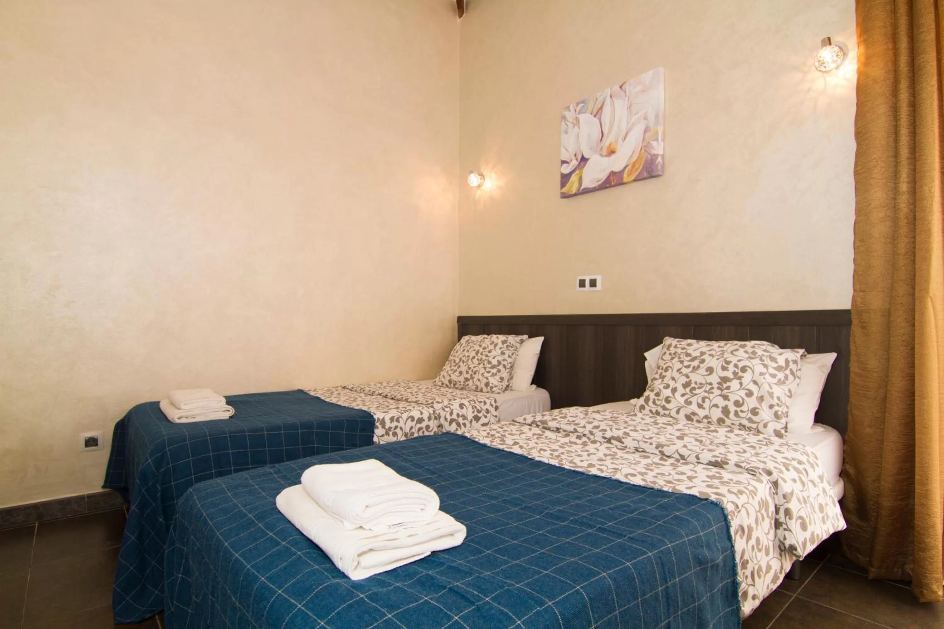 Bed in Yucca Park ApartHotel