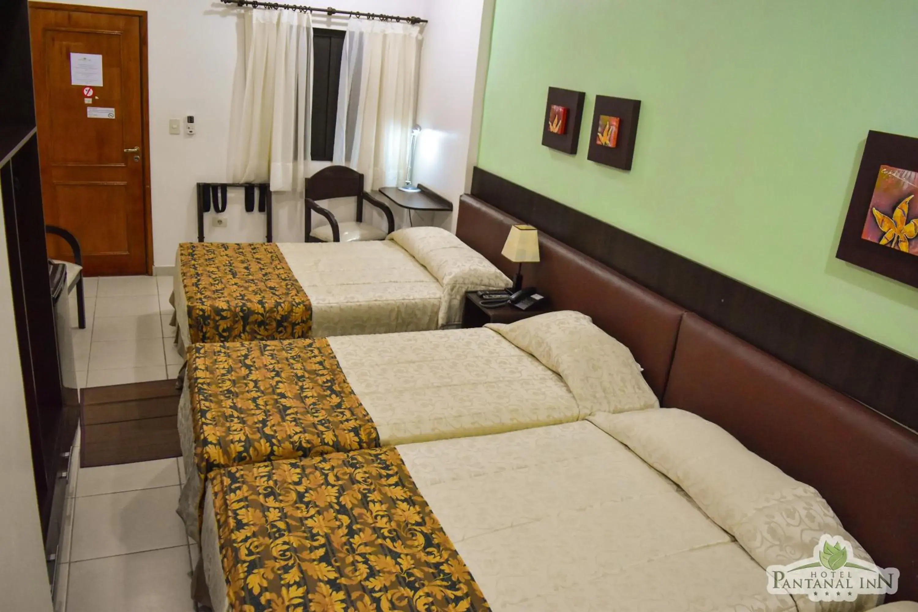 Triple Room in Hotel Pantanal Inn Triple Room in Hotel Pantanal Inn