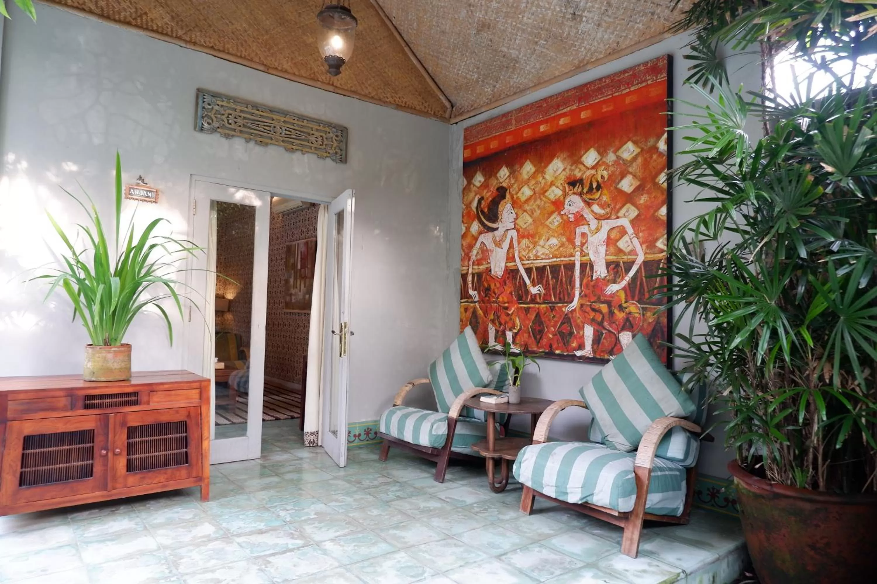 Seating area in D'omah Yogya Hotel