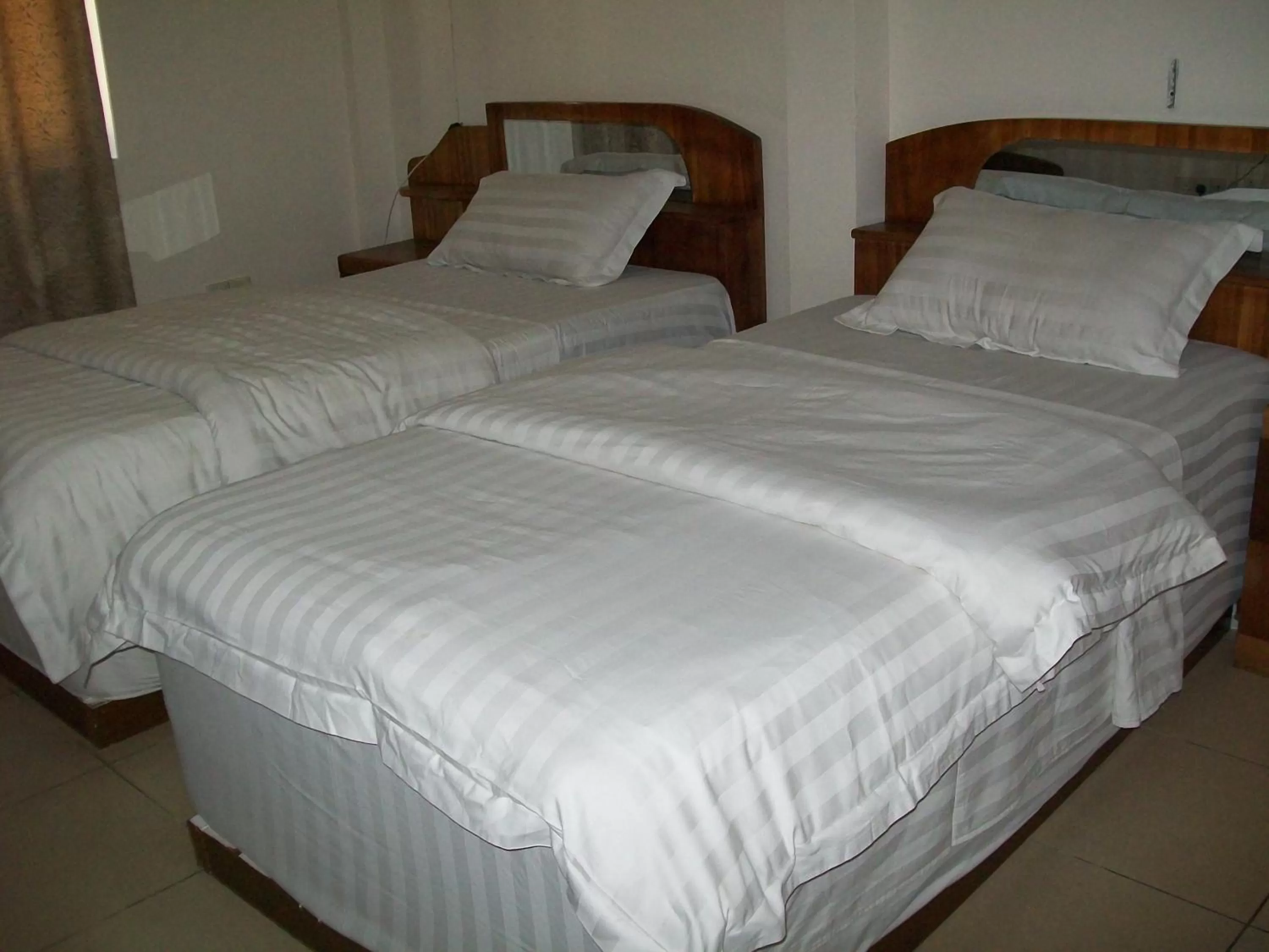 Bed in Ampomaah Hotel