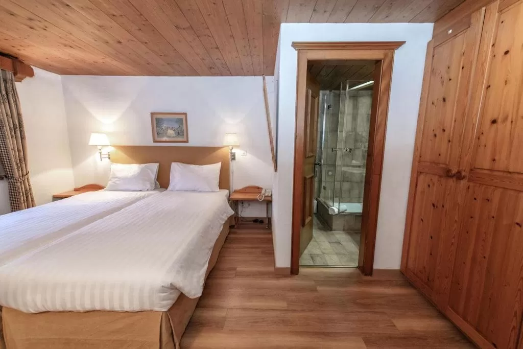 Bed in Hotel Steinbock