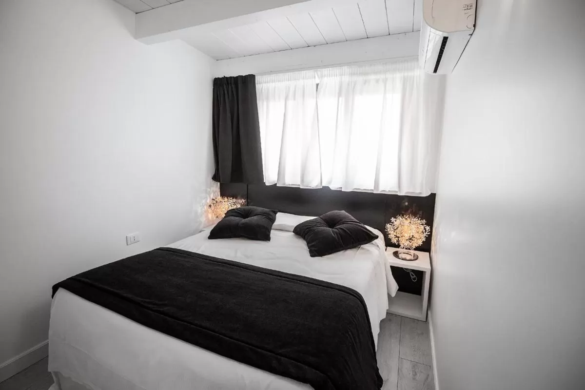 Bed in Hotel La Compagnia Del Viaggiatore