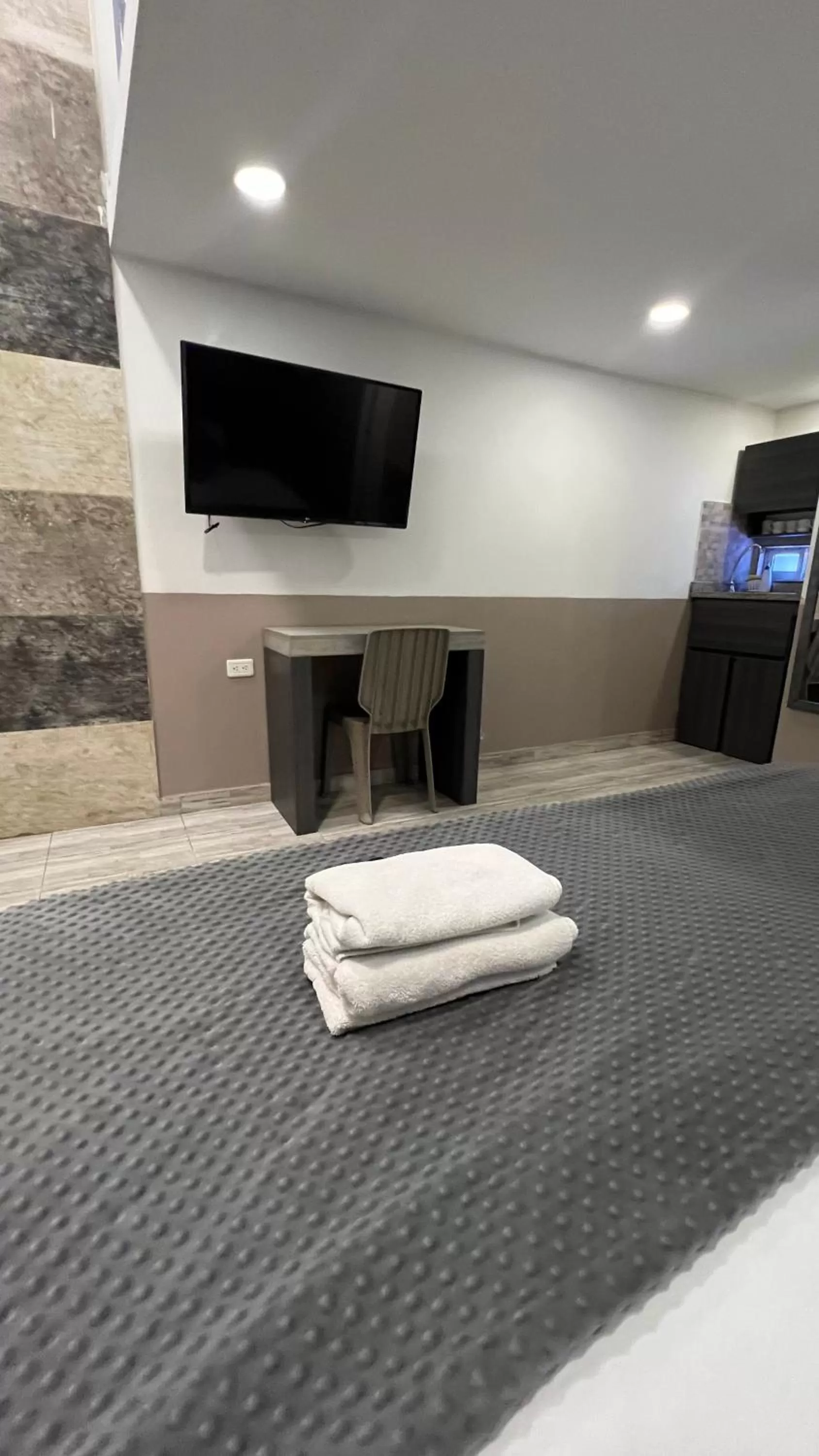 Bed in Bahia 79 Apartasuites Cerca al Centro