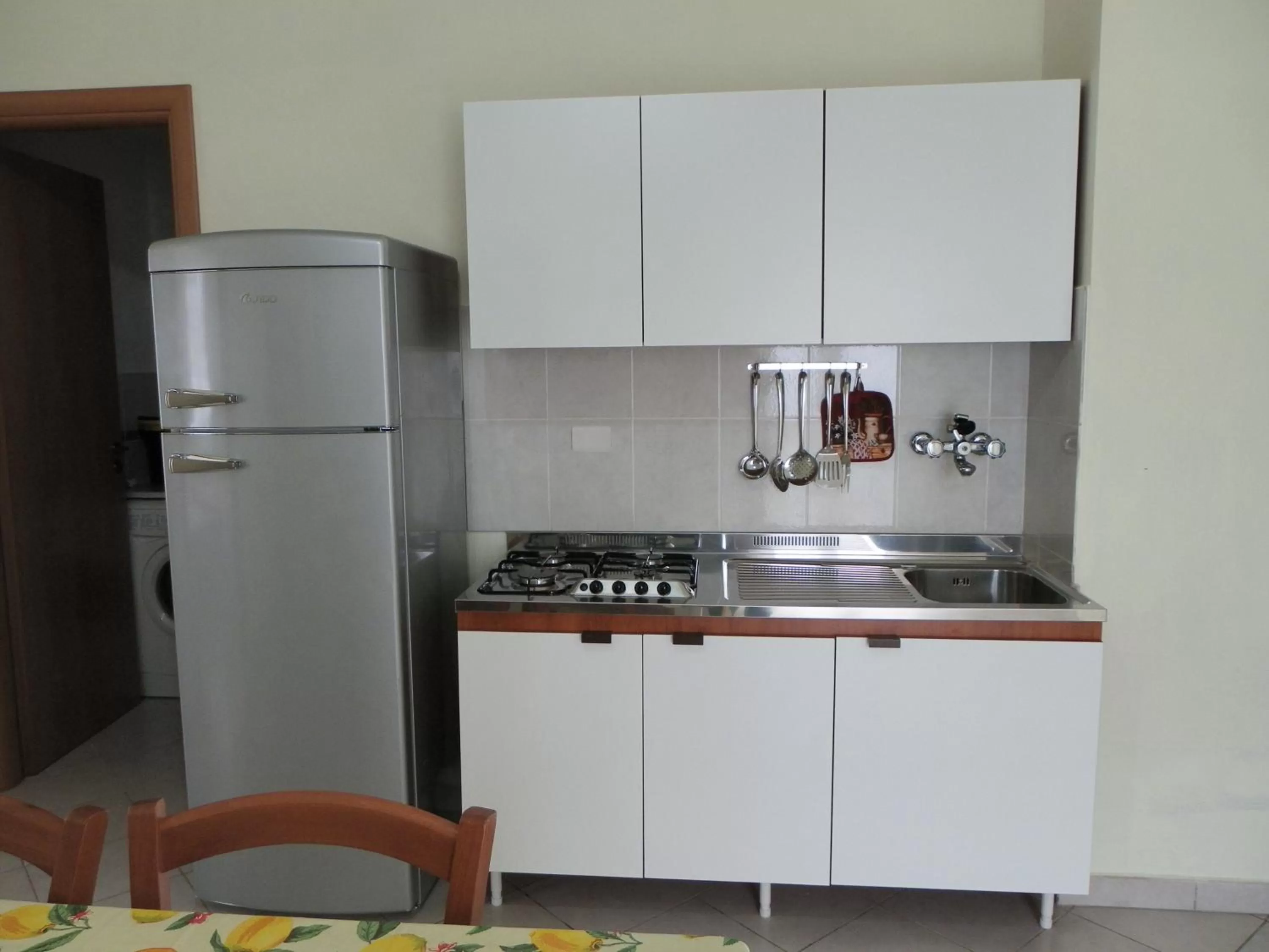 Kitchen or kitchenette in Residence Santa Barbara