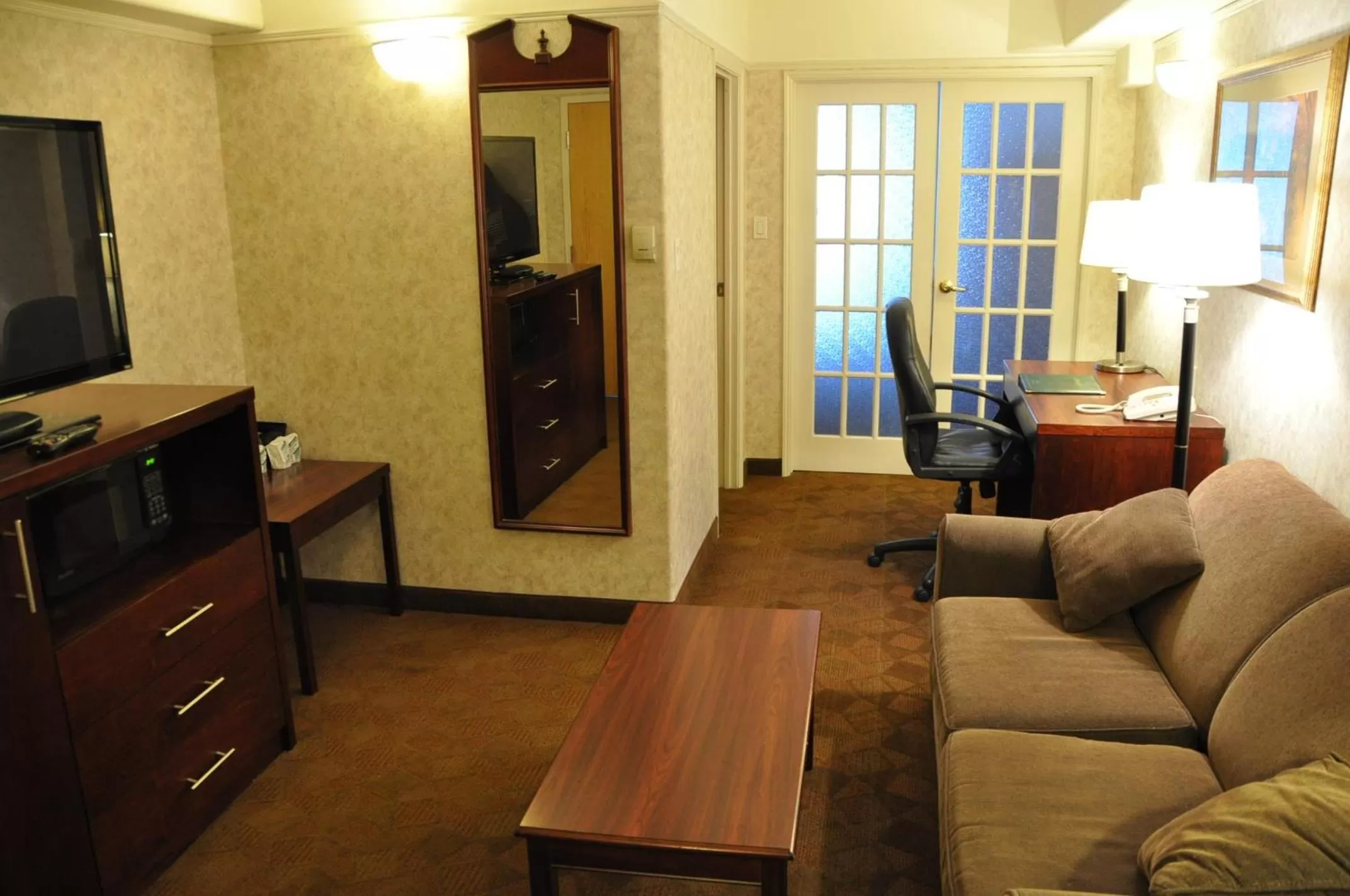 Living room in Travelodge by Wyndham Lloydminster