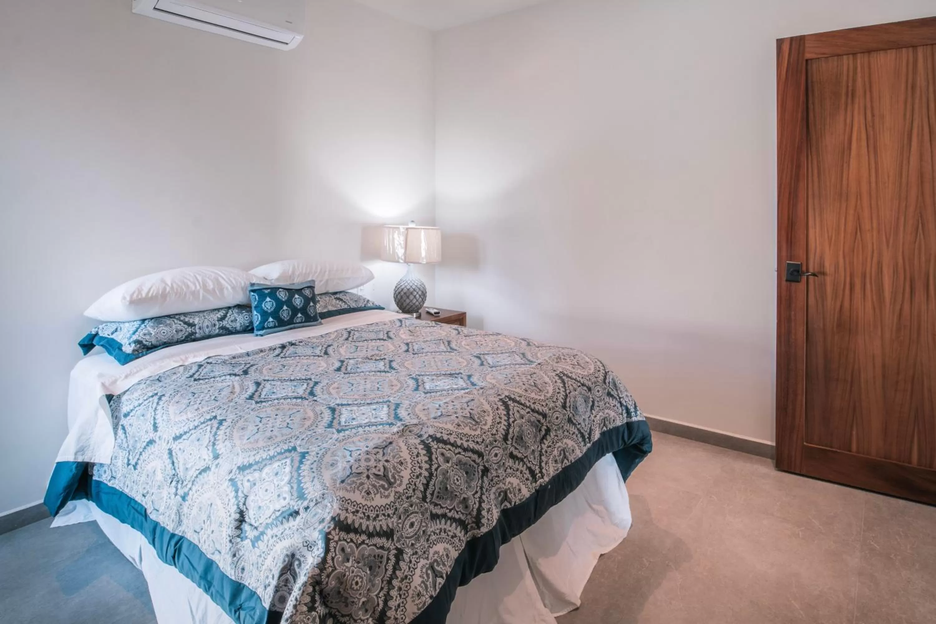 Bed in Cerritos Surf Residences