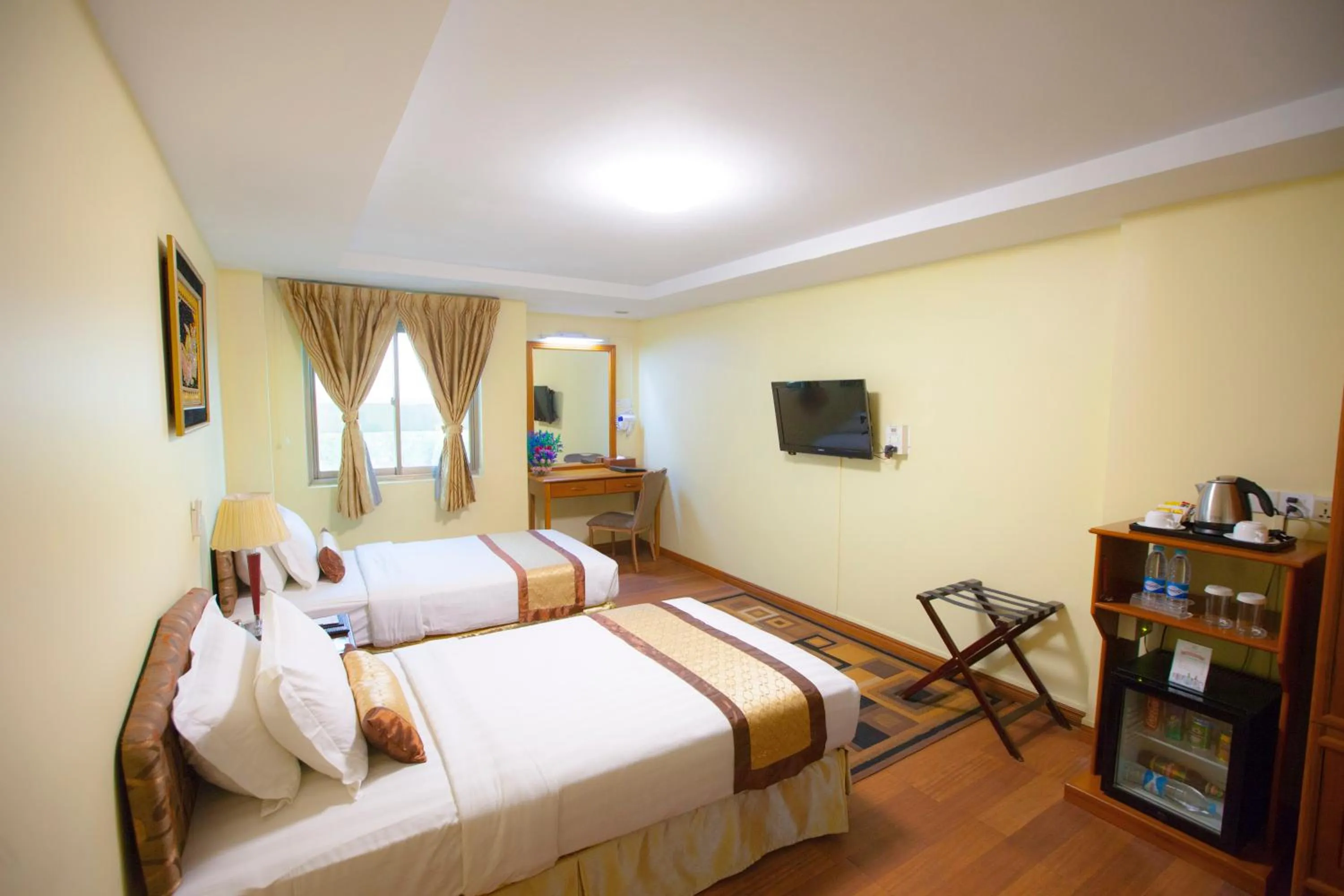 Bed in Grand Palace Hotel