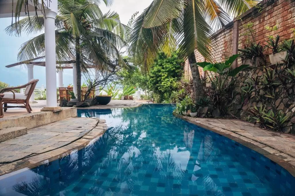 Swimming Pool in Sānti Beach House with pool & beach