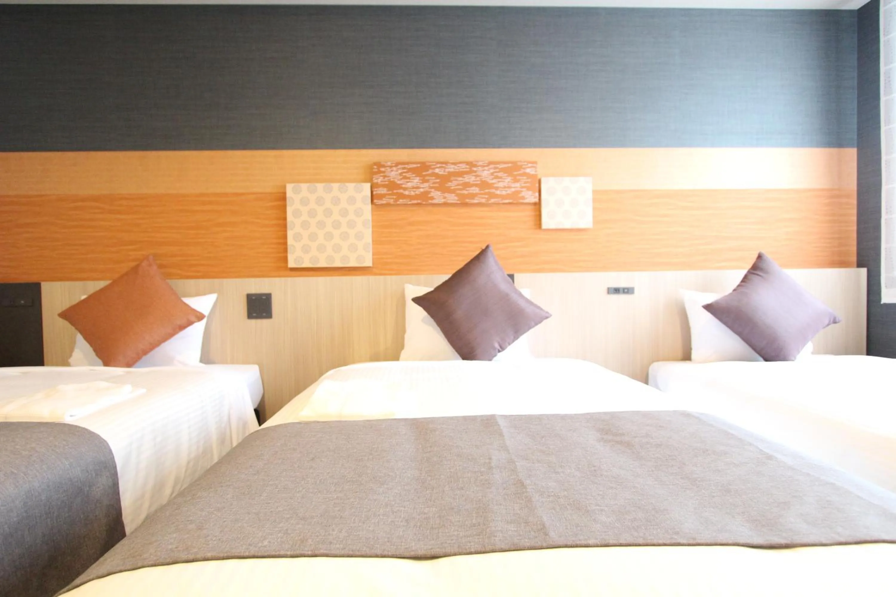 Bed in KOKO HOTEL Tsukiji Ginza