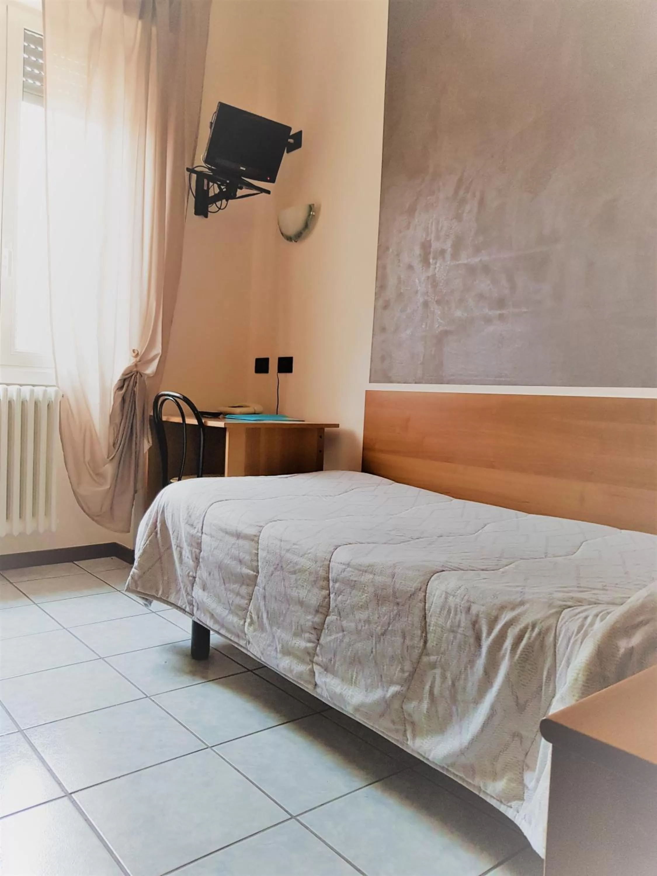 Bed in Hotel Marinoni