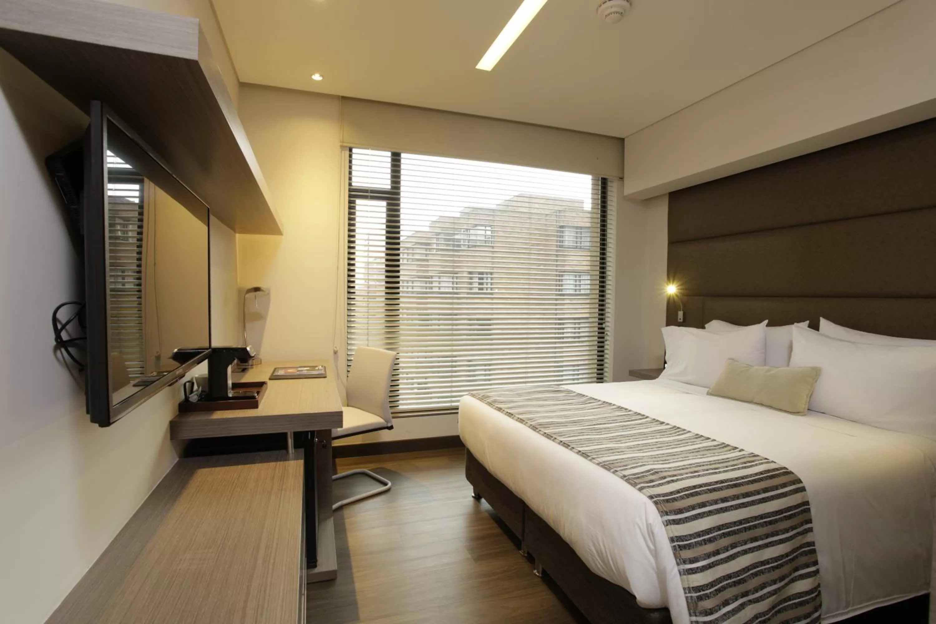 Bedroom in bs Rosales Hotel