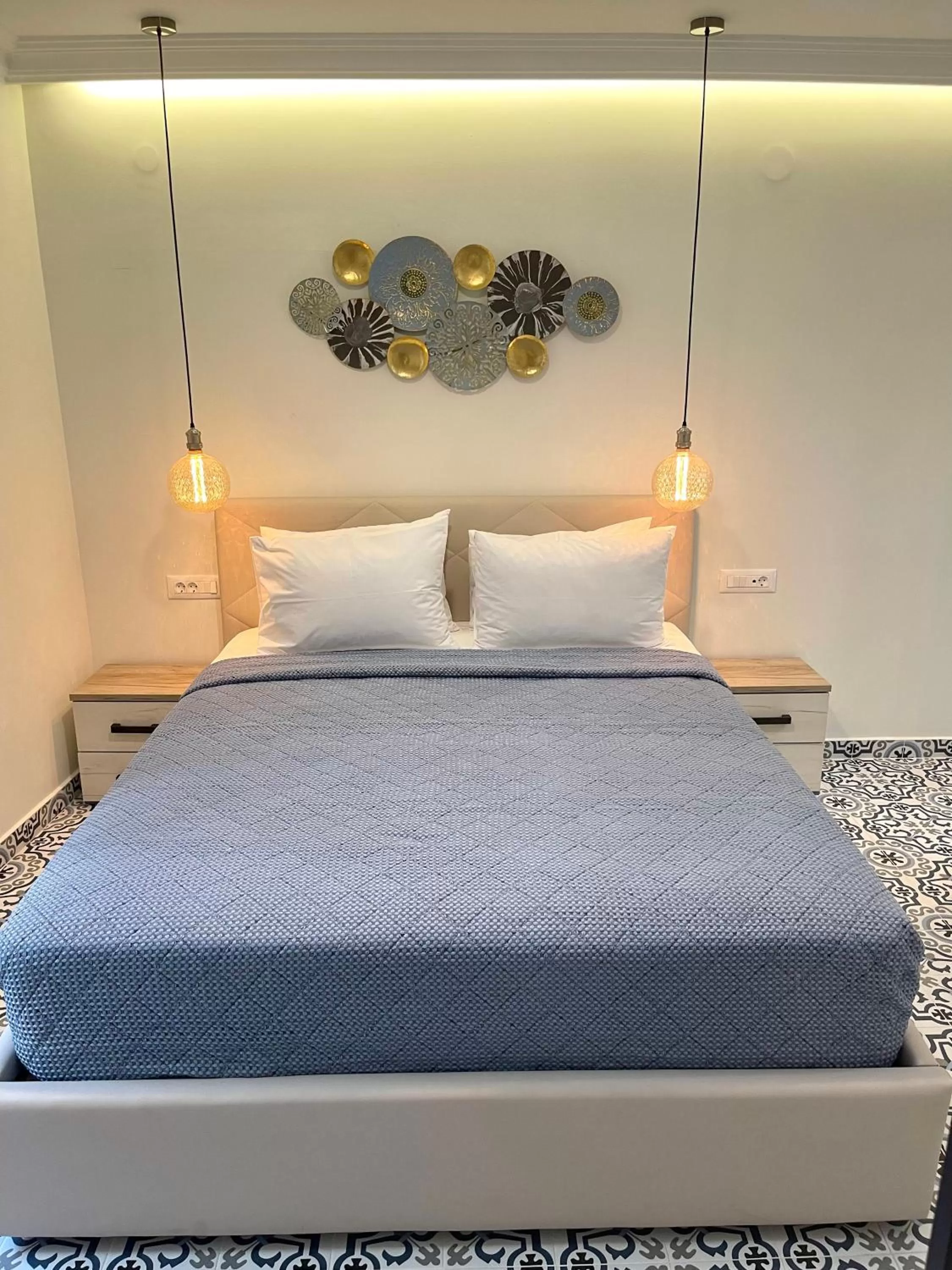 Bed in Aesthesis Arxontiko Luxury Rooms