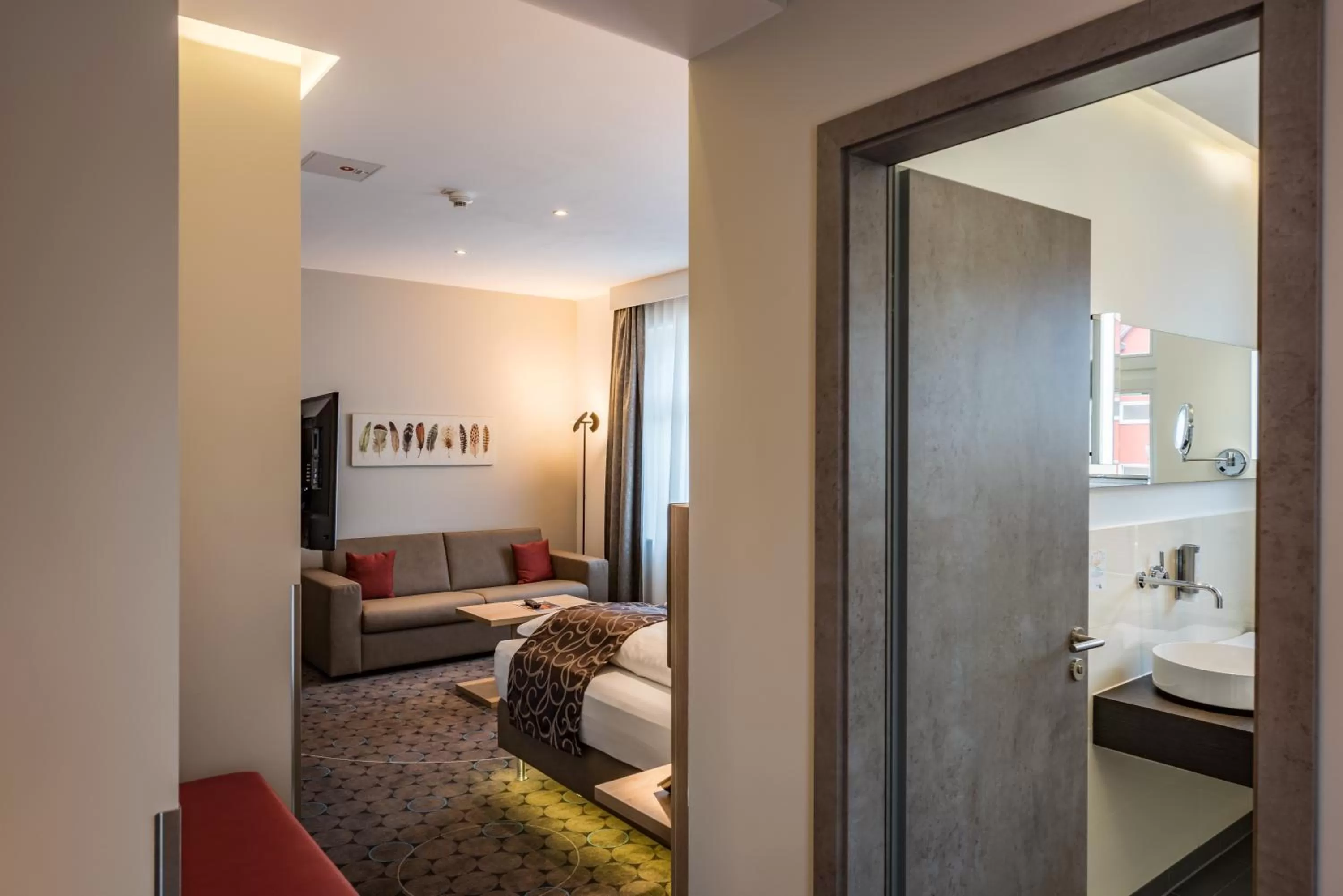 Photo of the whole room, Bed in AKZENT Hotel Villa Saxer