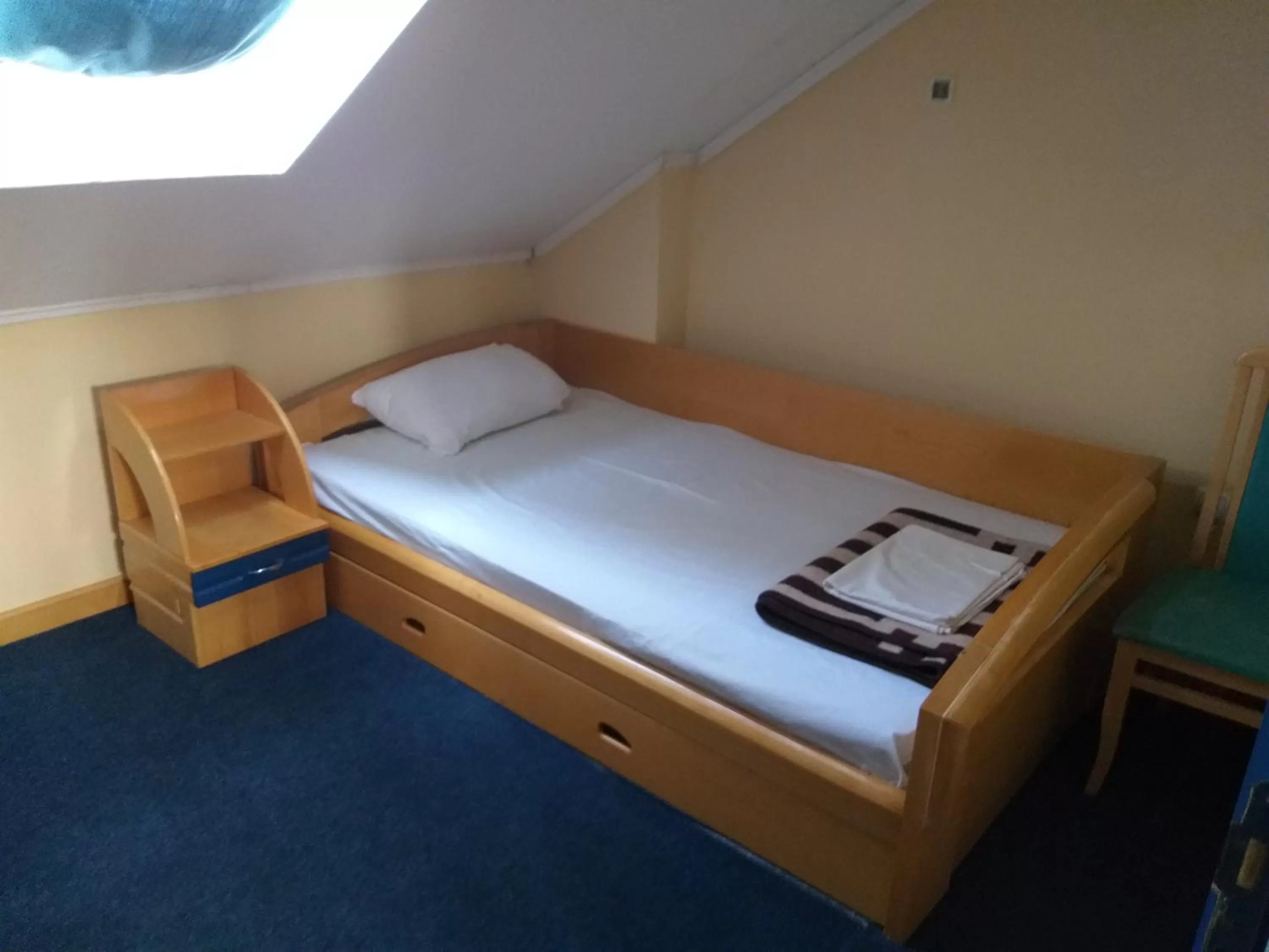 Photo of the whole room, Bed in Garni Hotel Lupus