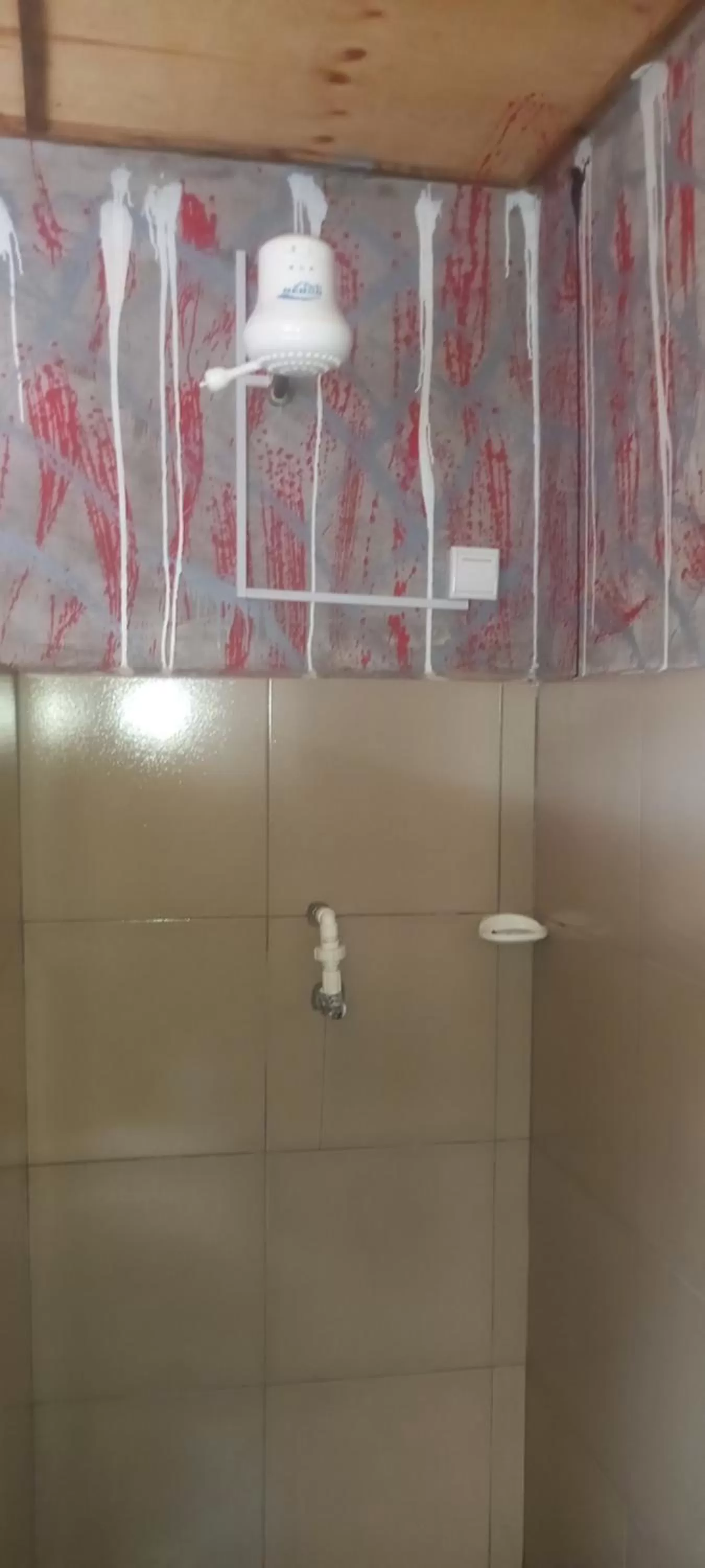 Bathroom in Tommy's Budget Rooms