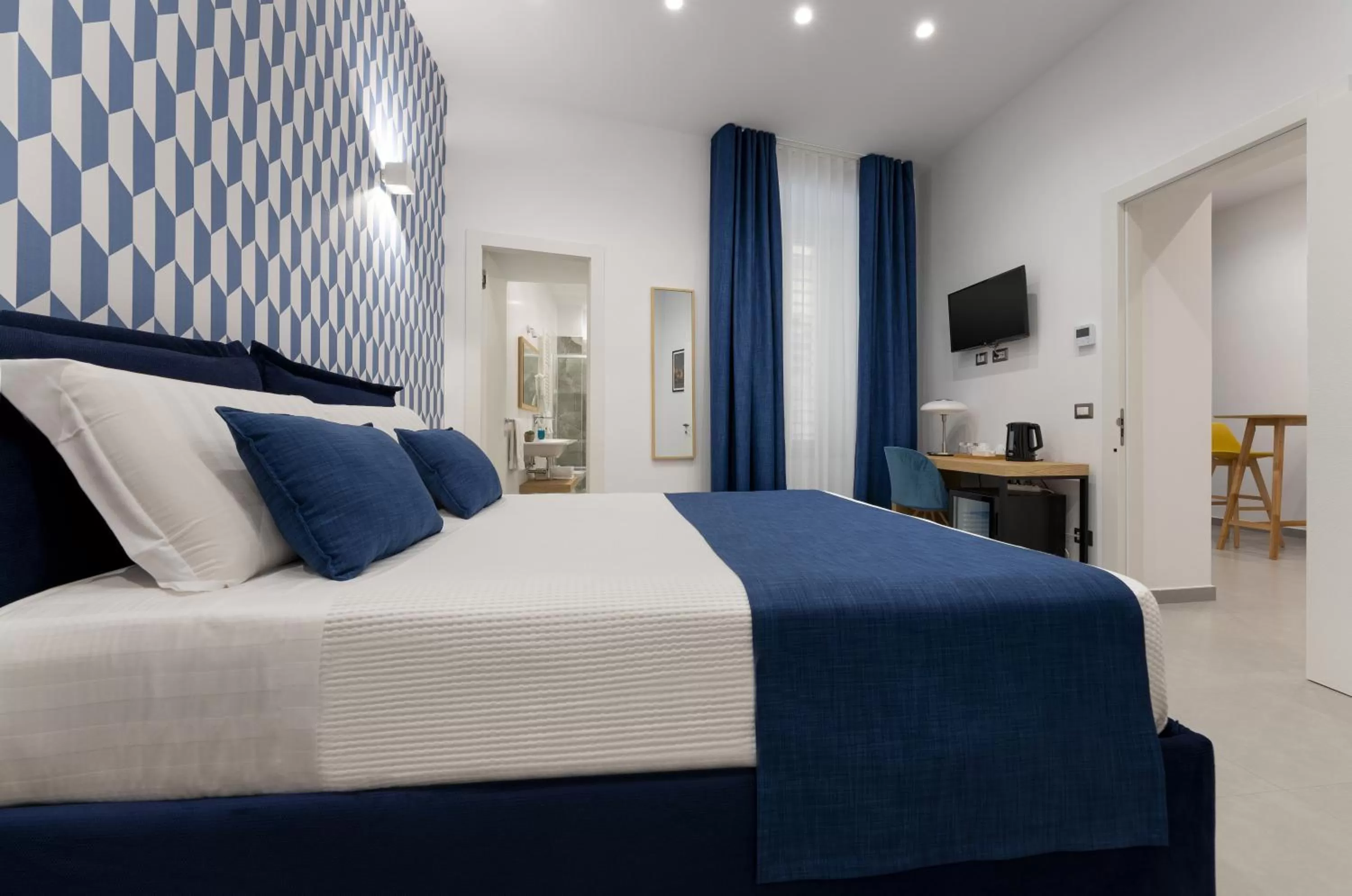 Bed in HSuites Luxury B&B