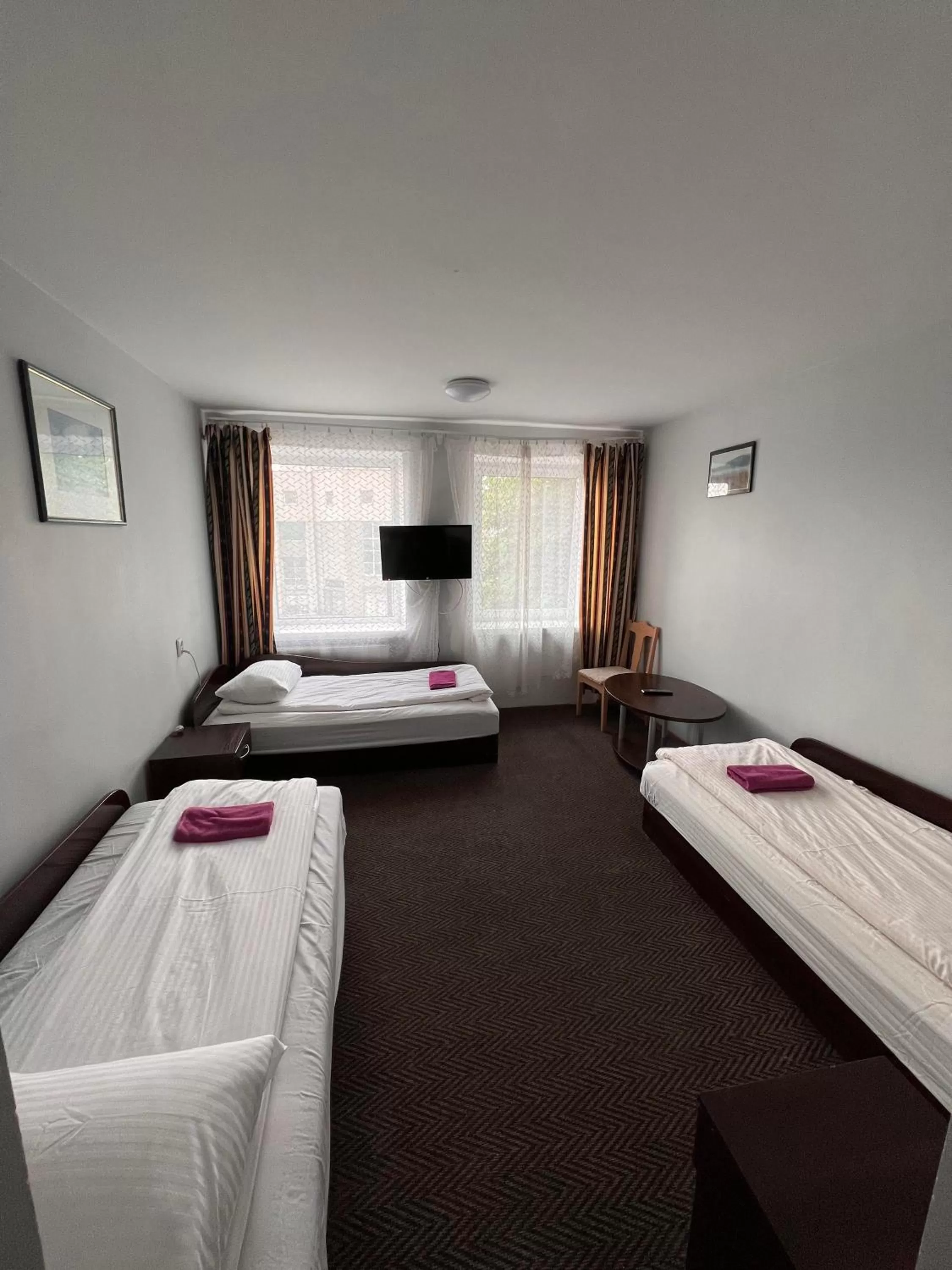 Bed in Dzukija Hotel