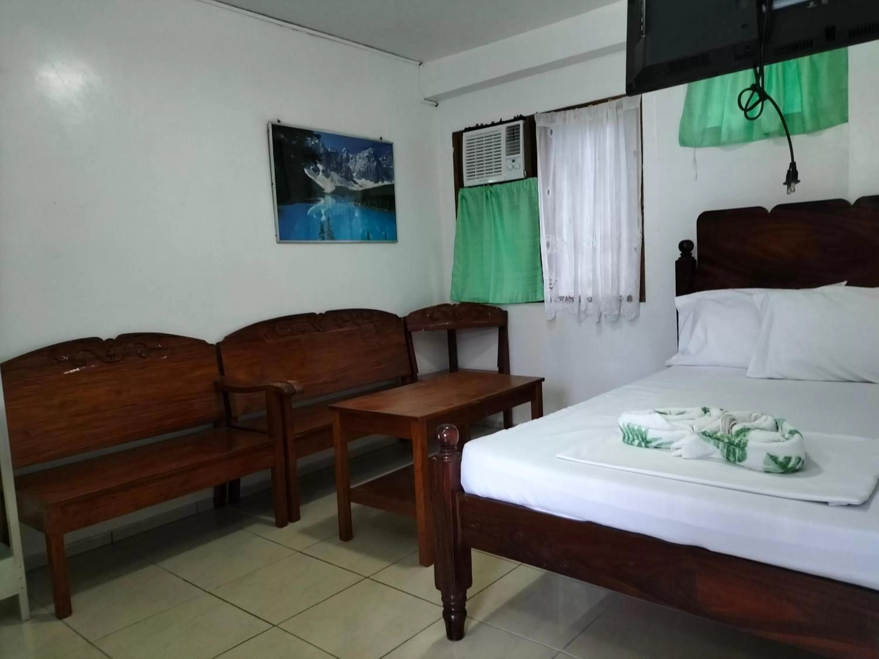 Bed in Princess of Coron Austrian Resort