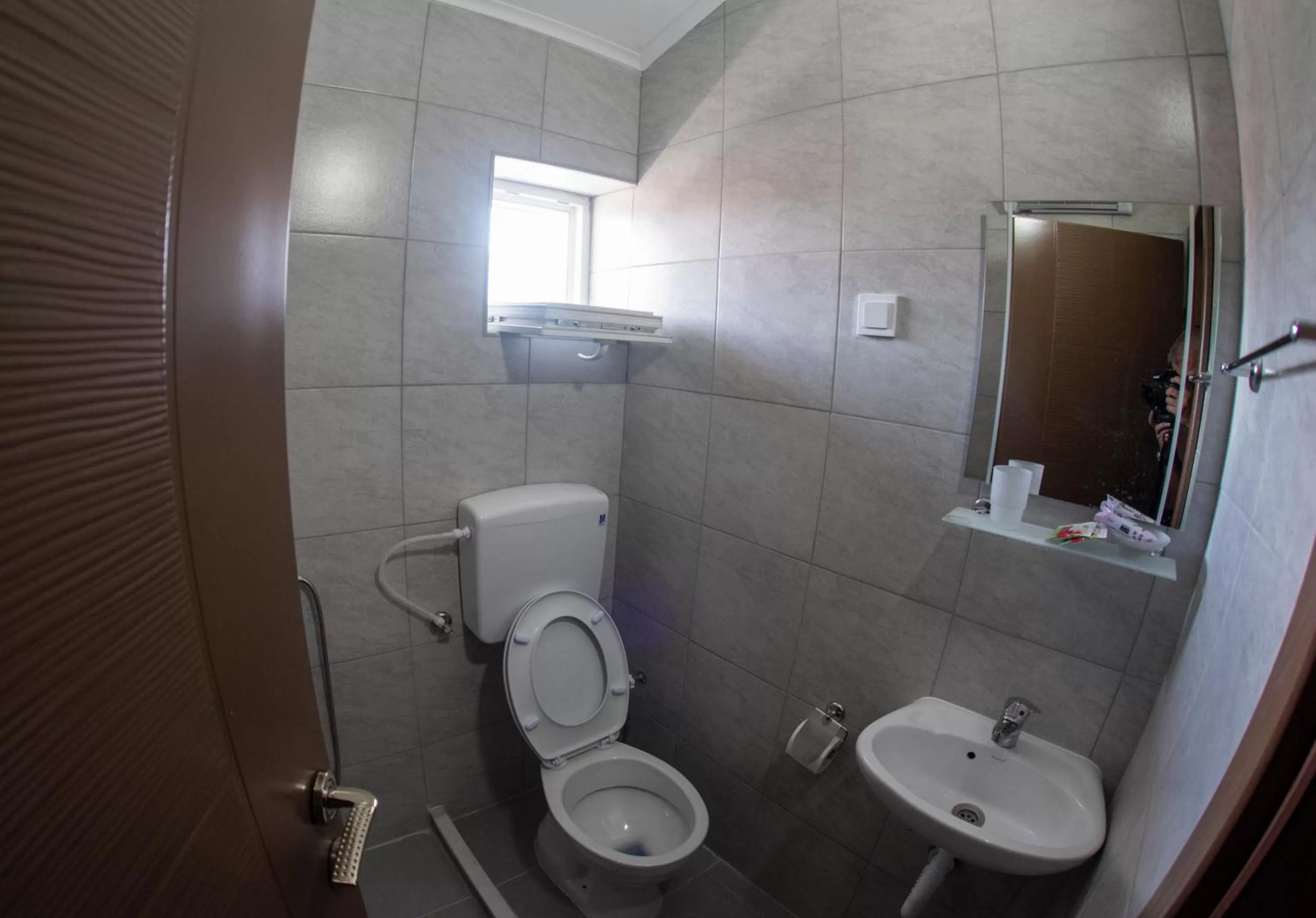 Bathroom in DIONIS Rooms & Apartments