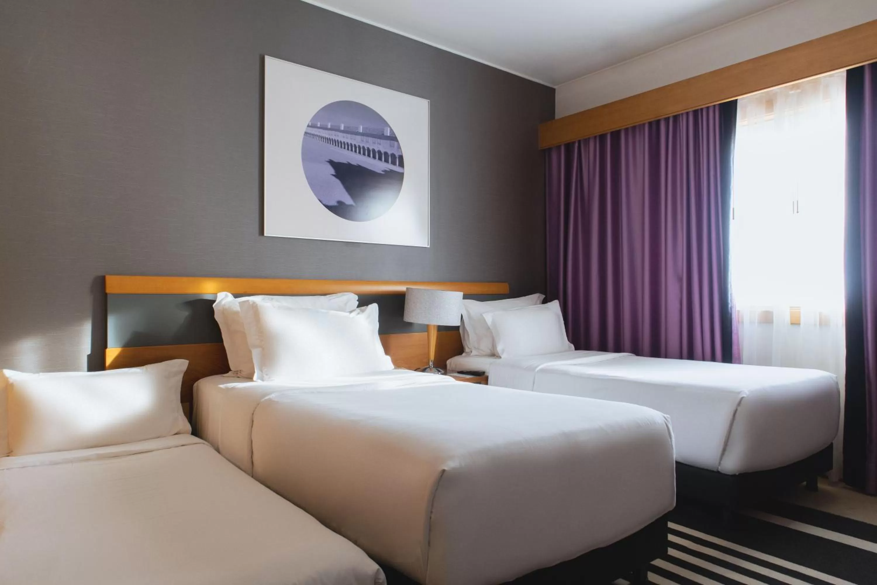 Bed in SANA Sesimbra Hotel