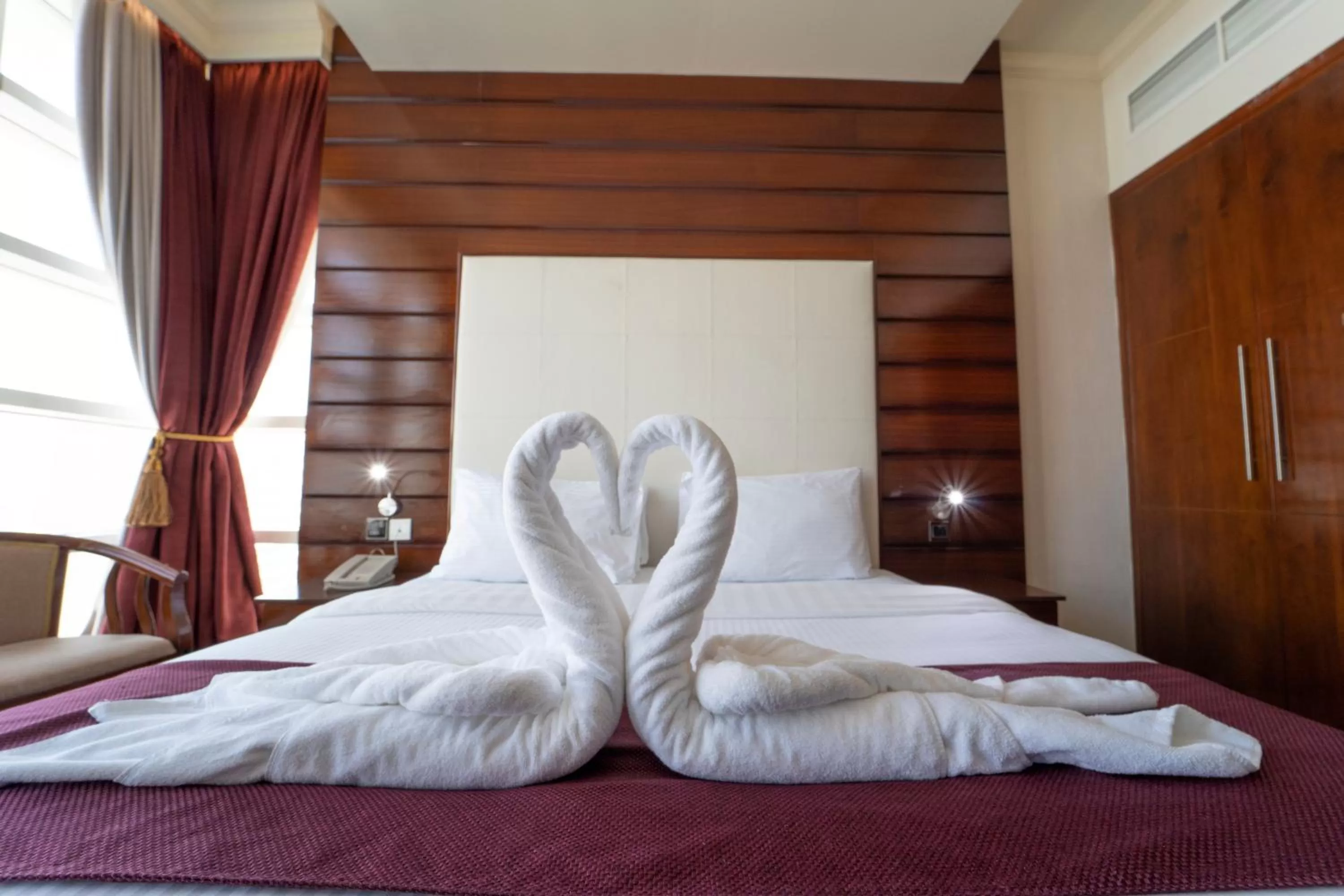 Bed in Queen Palace Hotel