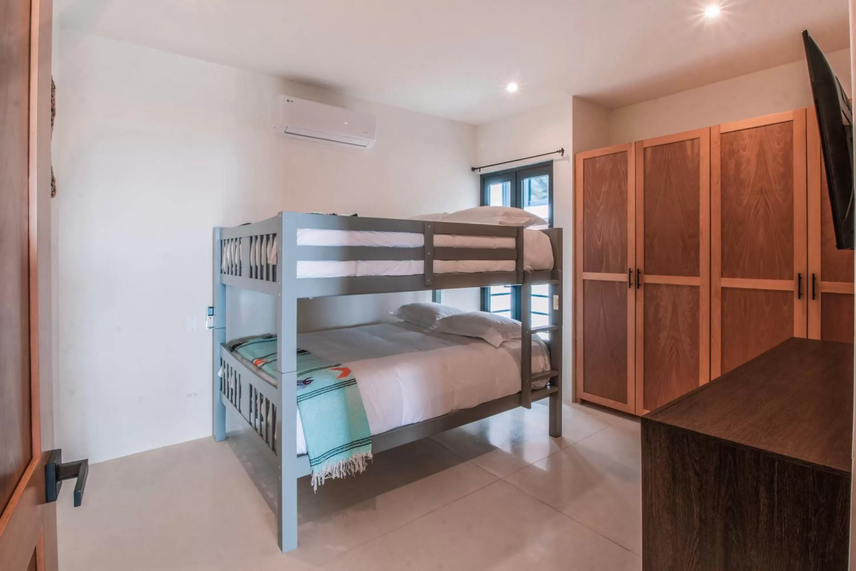 Photo of the whole room, Bunk Bed in Cerritos Surf Residences