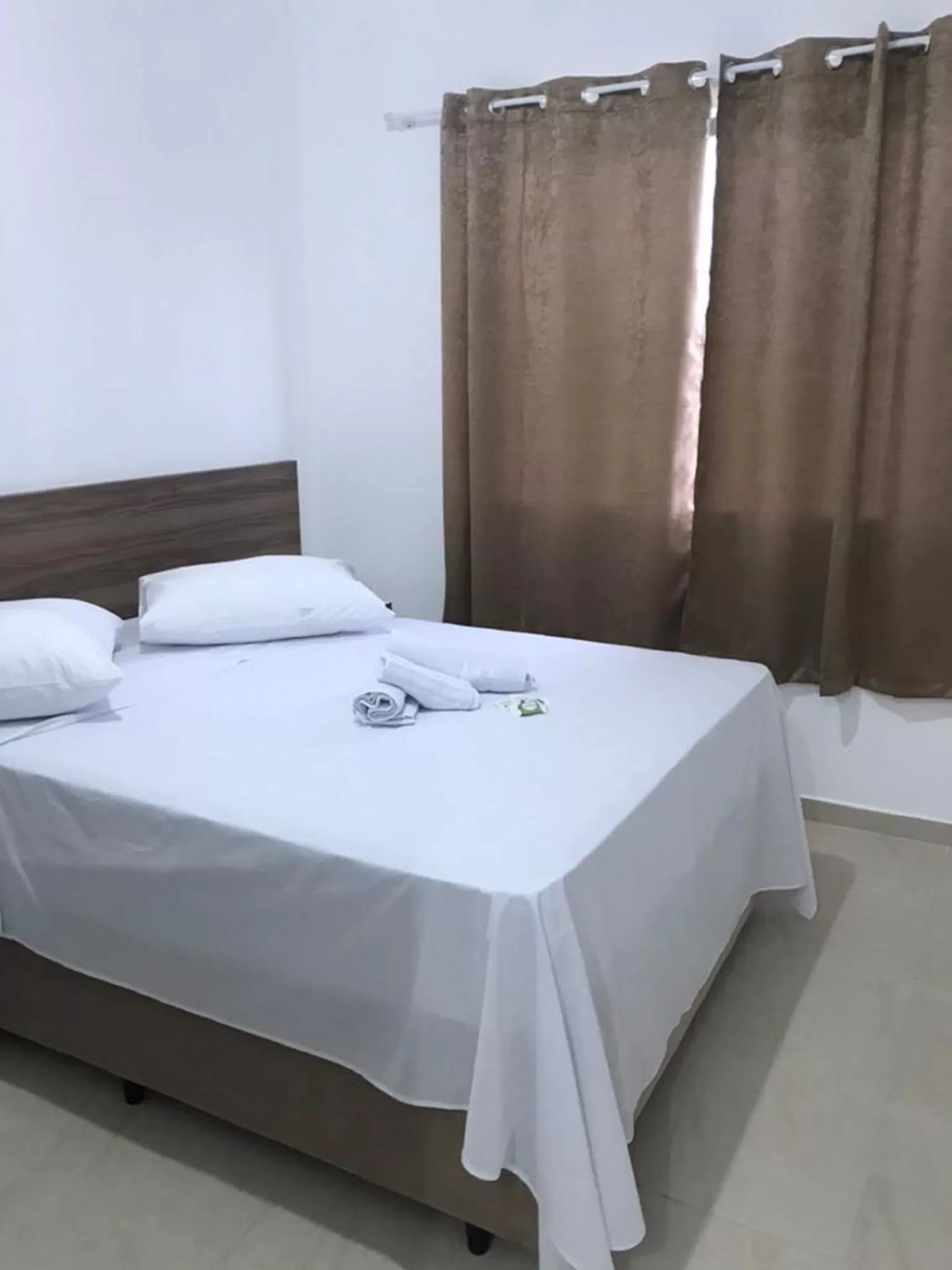 Bed in Pousada Vó Dena