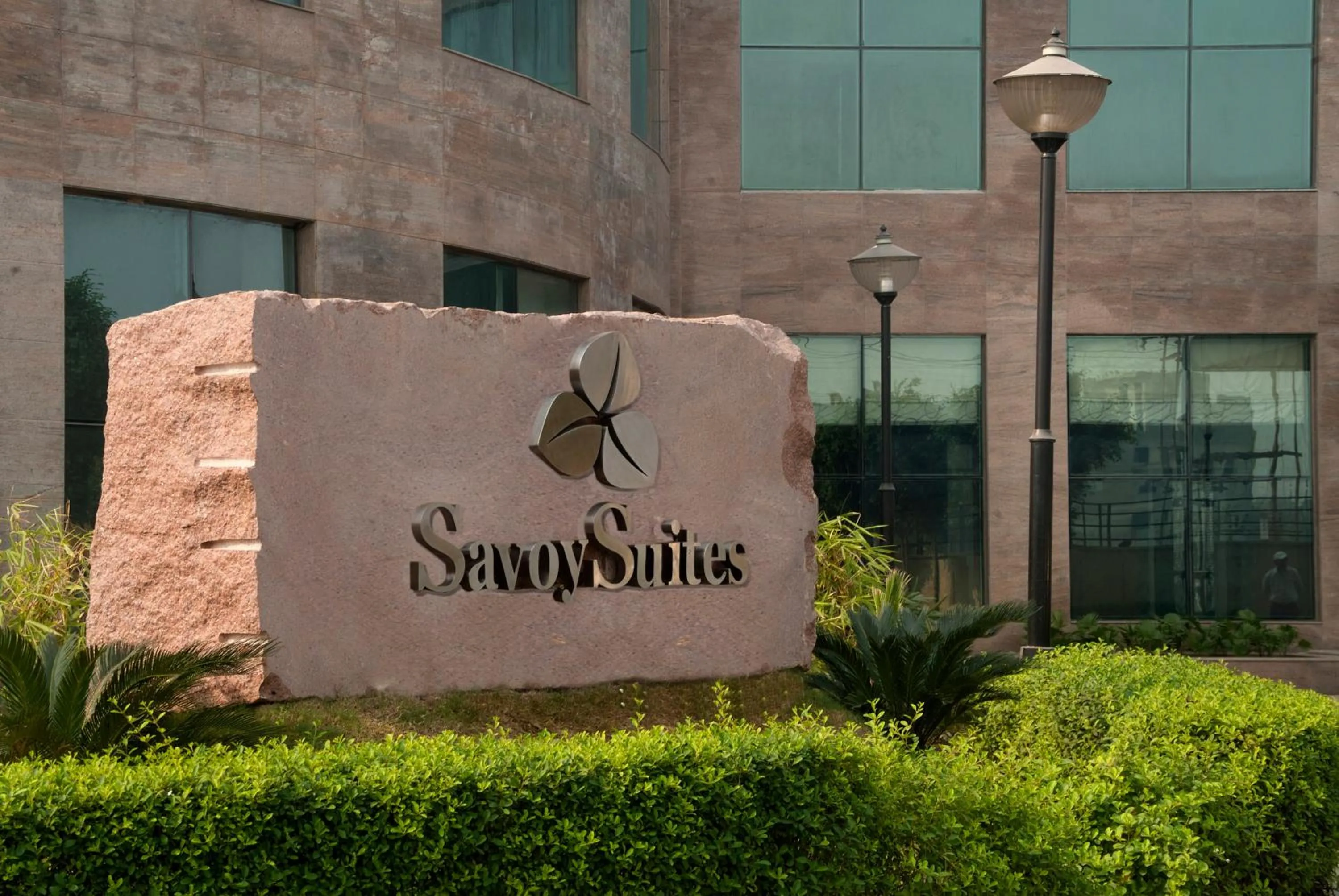 Property logo or sign in Savoy Suites Greater Noida