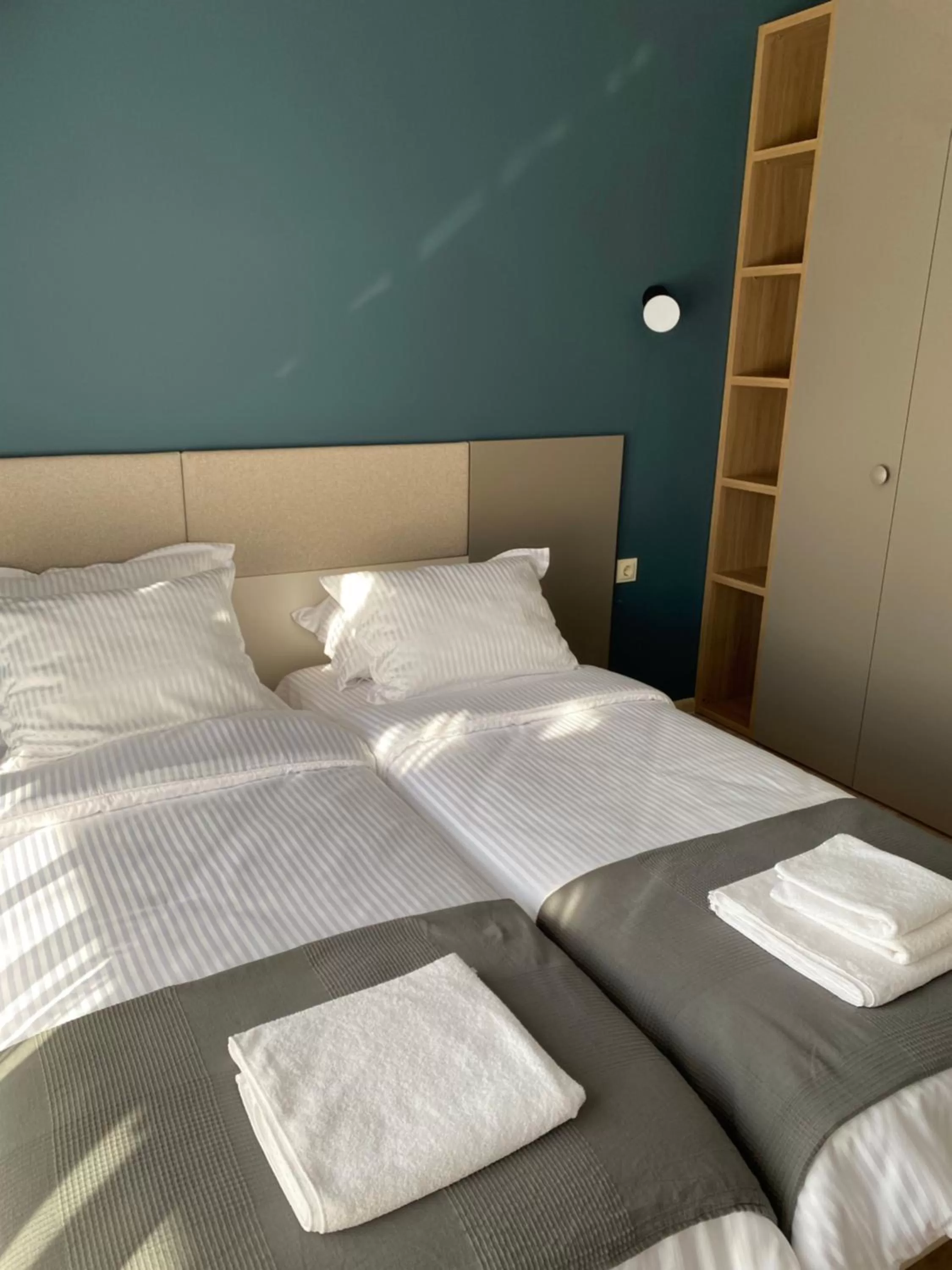 Bed in 7th Sense boutique apartments