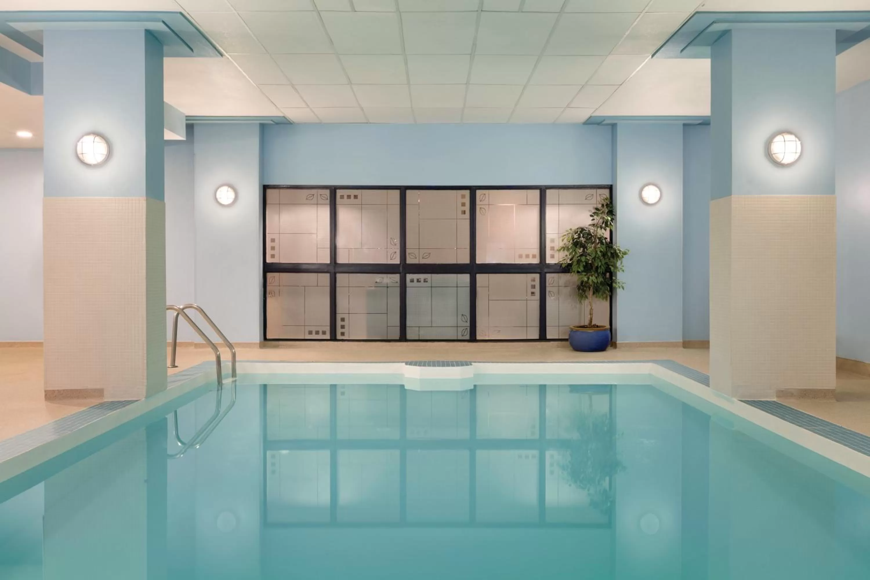 Swimming pool in Coast Edmonton Plaza Hotel by APA