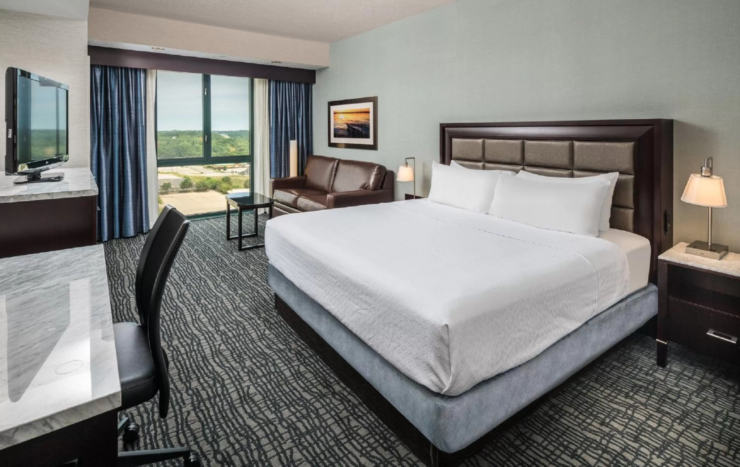 Photo of the whole room, Bed in Crowne Plaza Springfield Convention Center by IHG