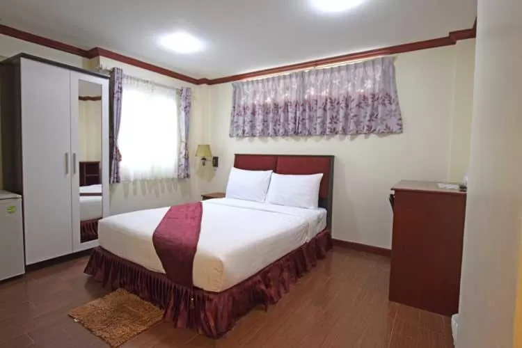 Bed in Bluebird Inn Pattaya