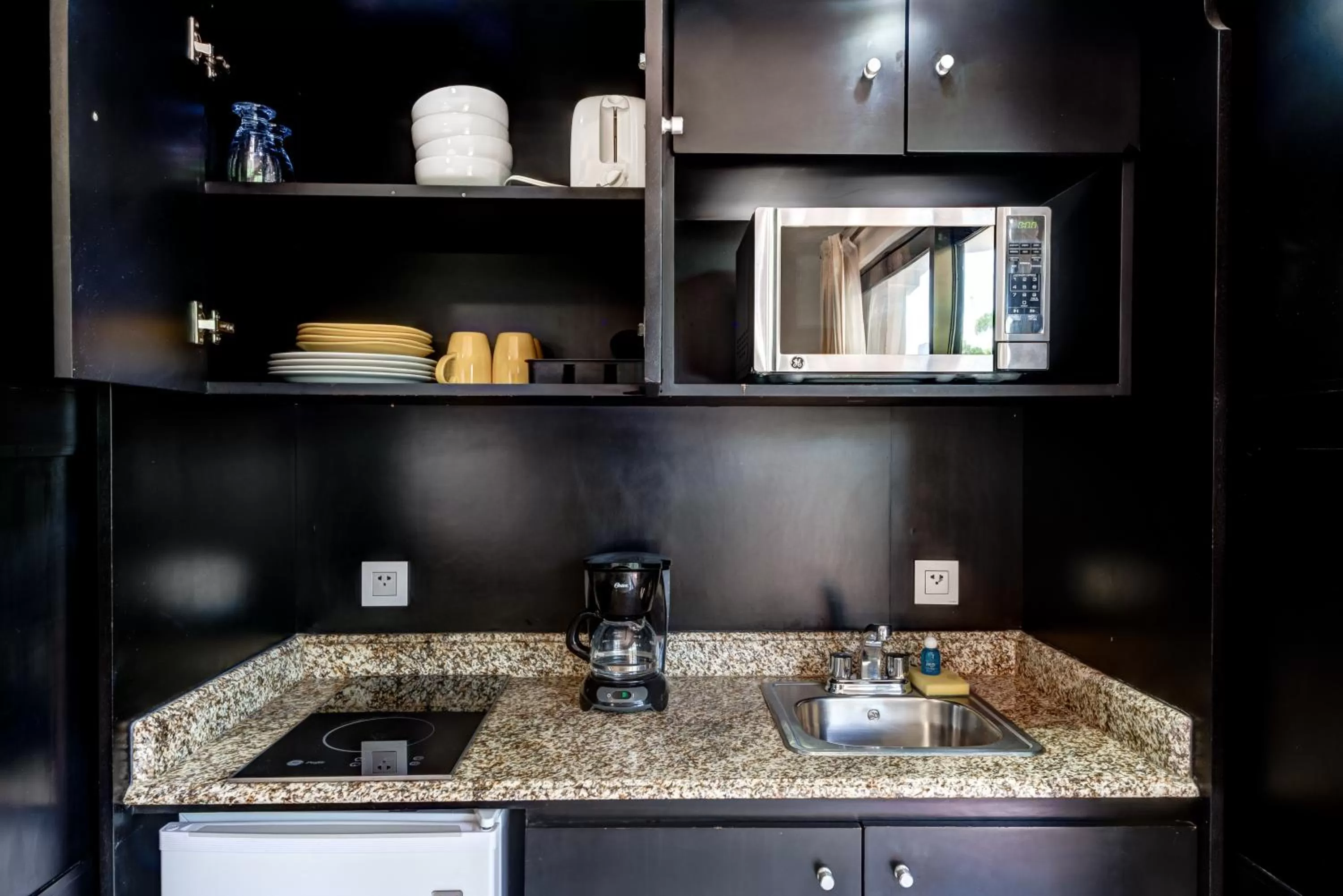 Kitchen or kitchenette in Suites Corazon