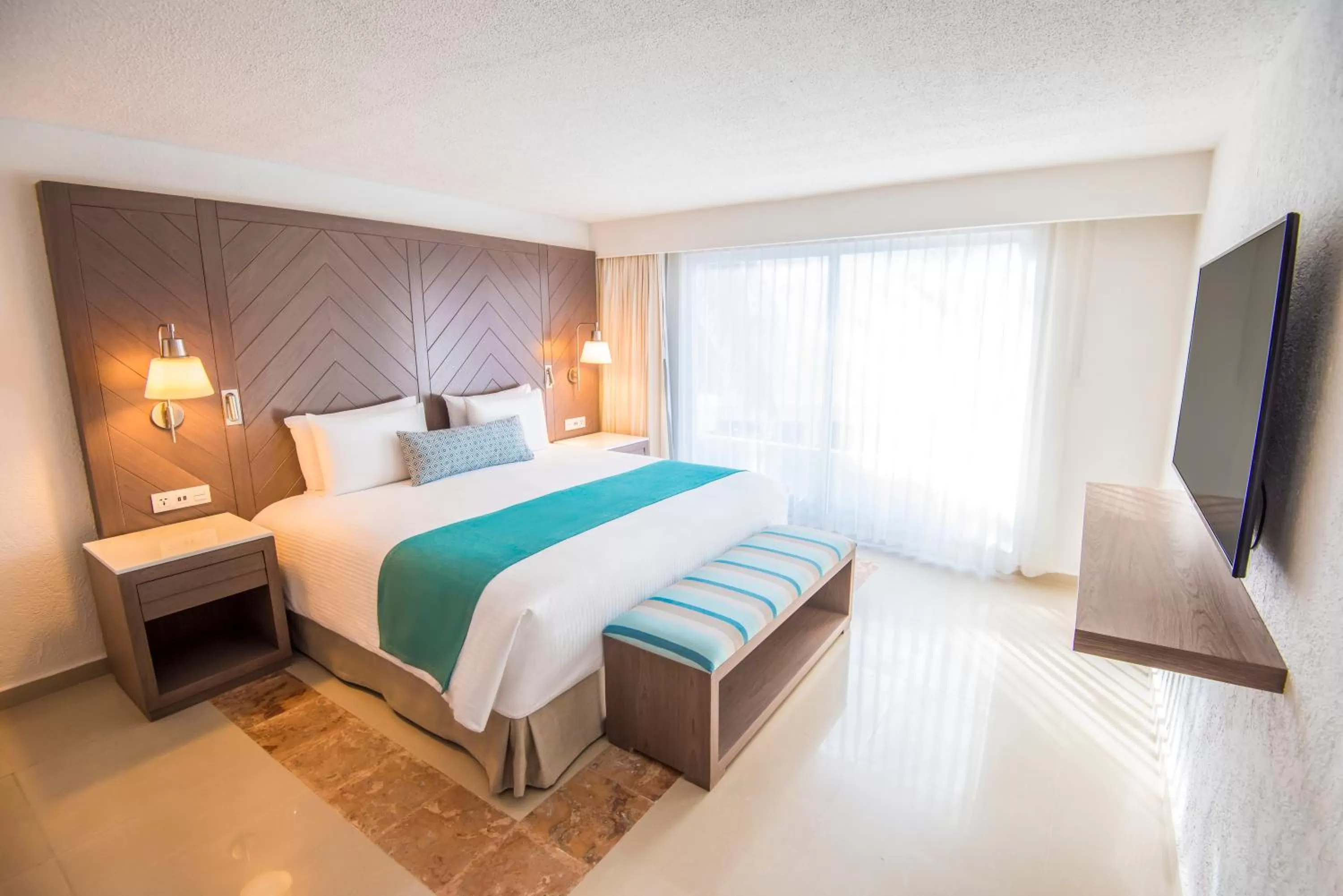 Bed in Sunscape Cancun All-Inclusive Resort & Spa by Hyatt
