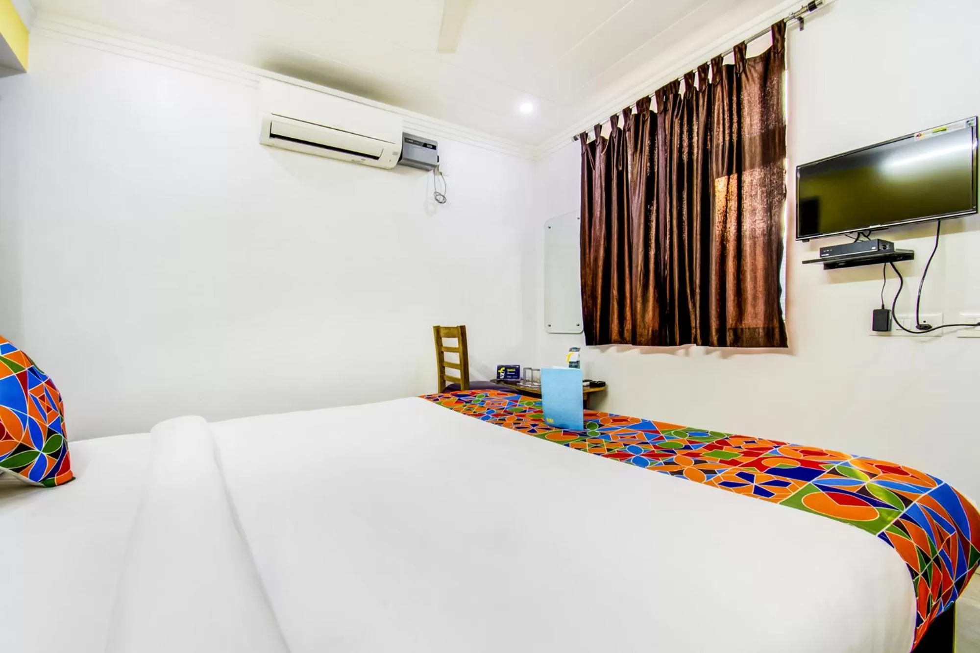 Bedroom, Bed in FabHotel Grand Sheela
