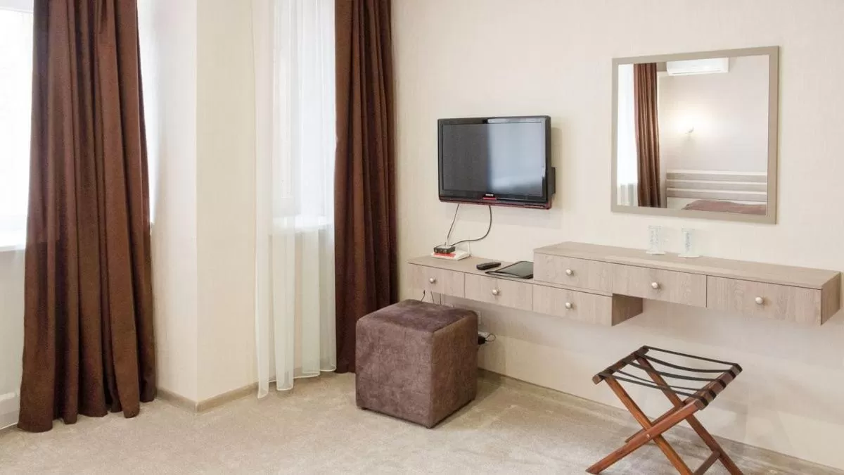 Communal lounge/ TV room in Reikartz Dostar Karaganda