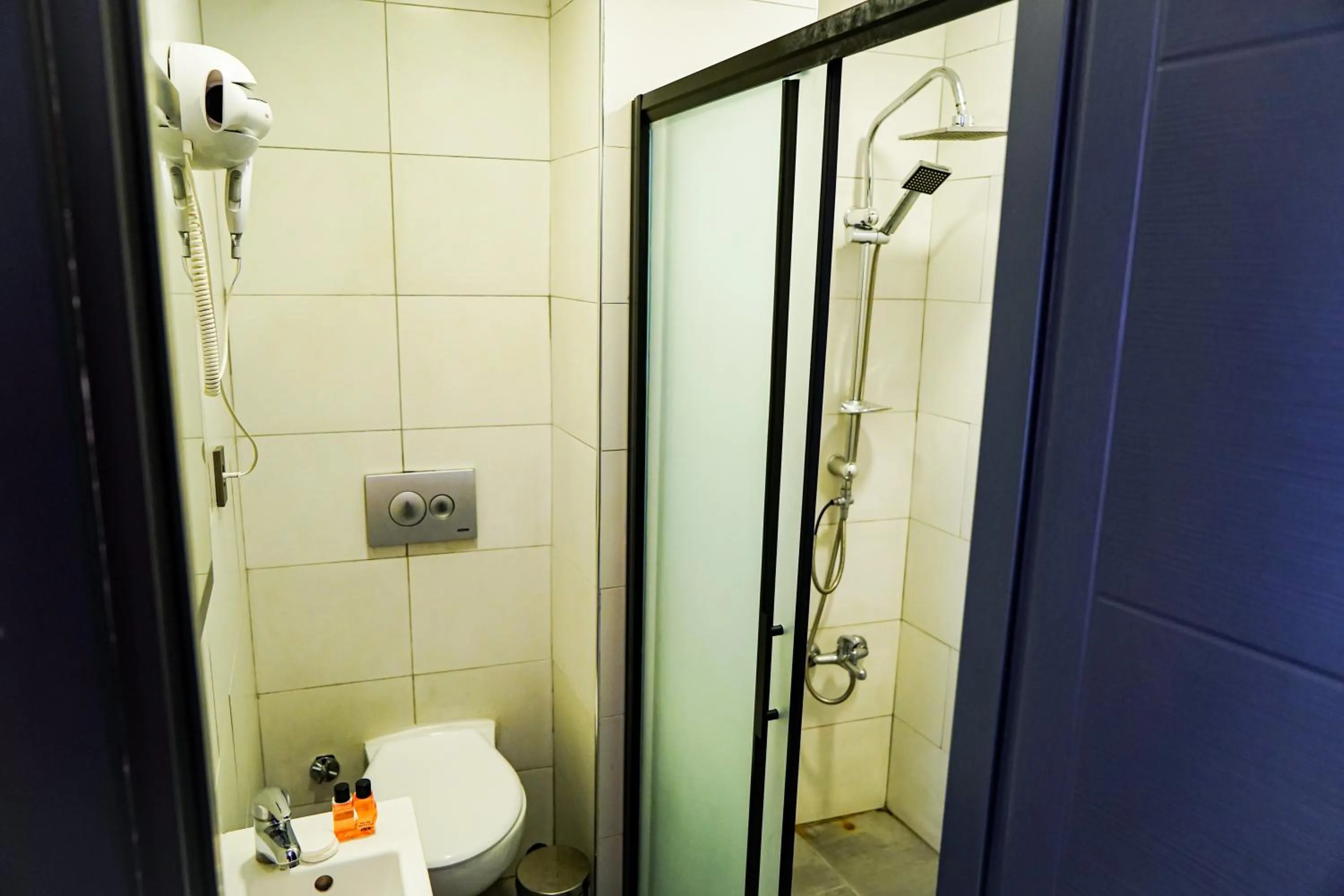 Toilet, Bathroom in Paradise Hotel