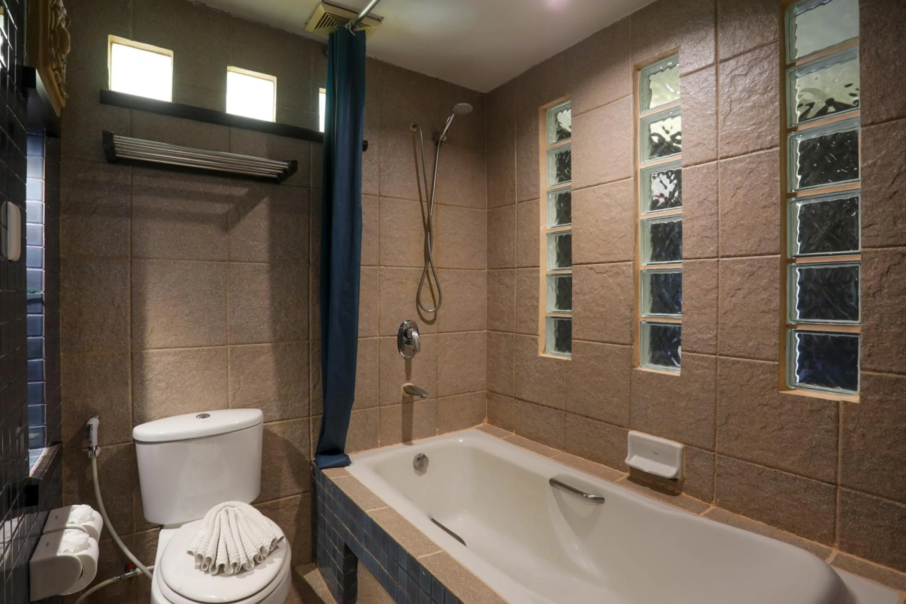 Bathroom in Woraburi Phuket Resort & Spa - SHA Plus