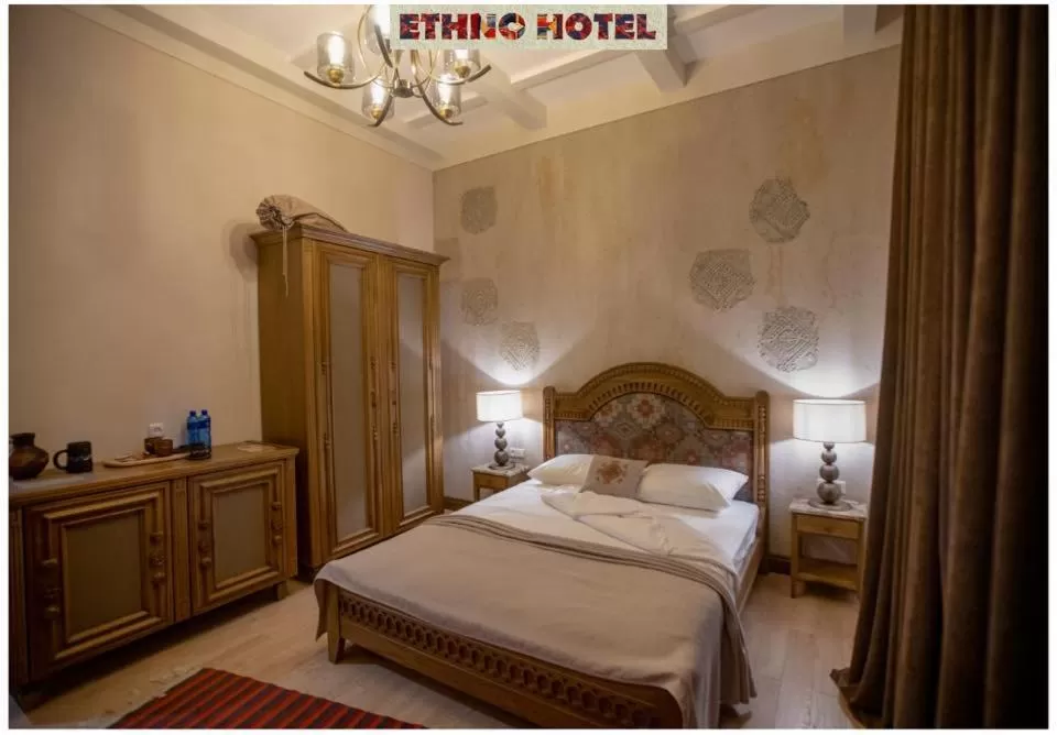 Bed in Boutique ETHNO HOTEL