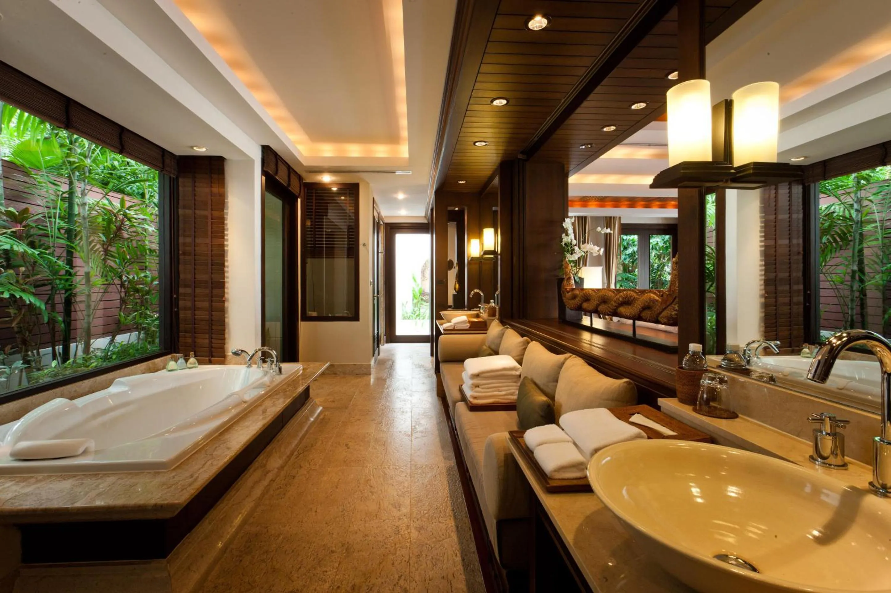 Bathroom, Bed in Trisara Villas & Residences Phuket