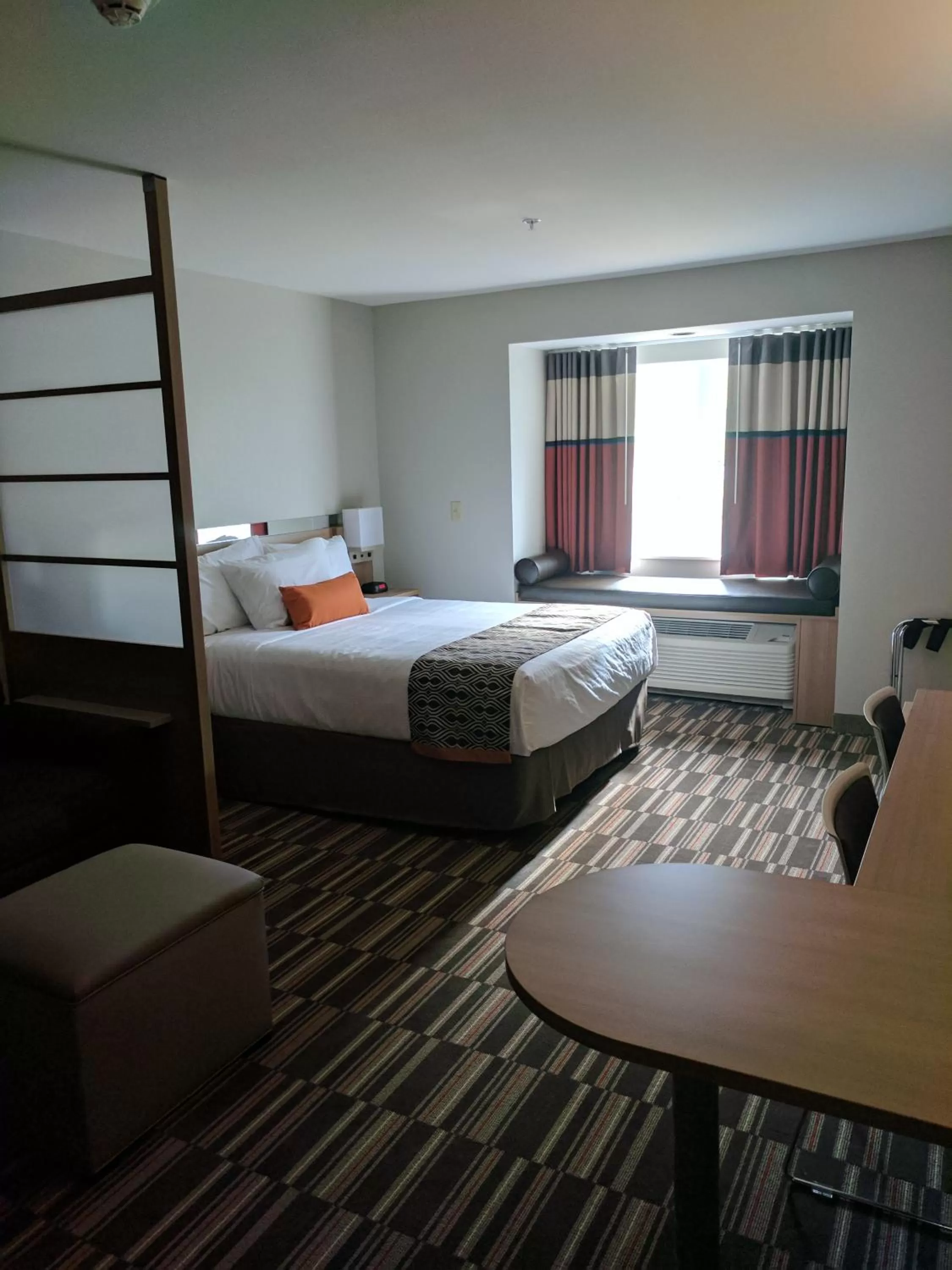 Bed in Microtel Inn & Suites by Wyndham Clarion