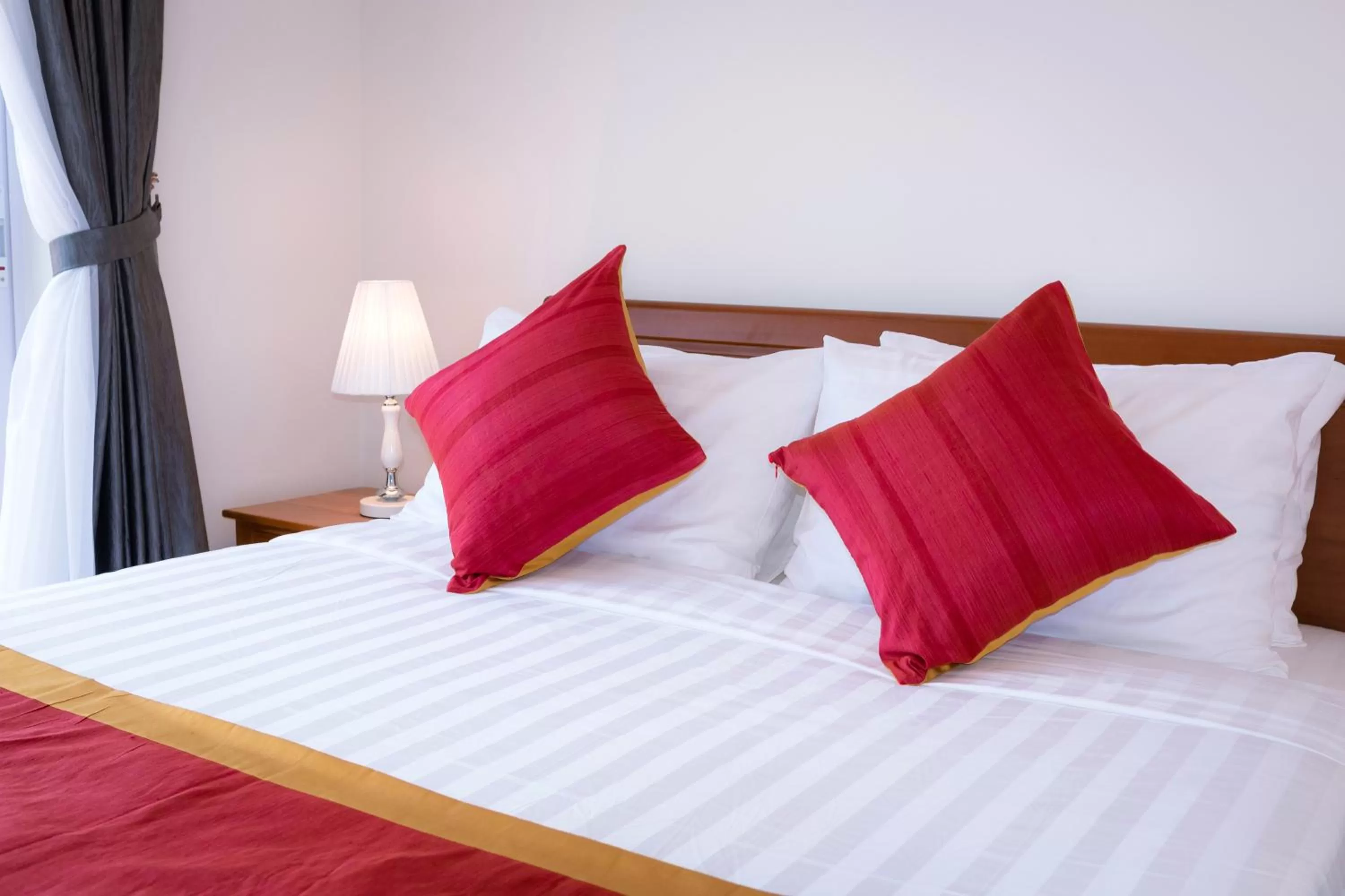 Bed in Sun Apartment