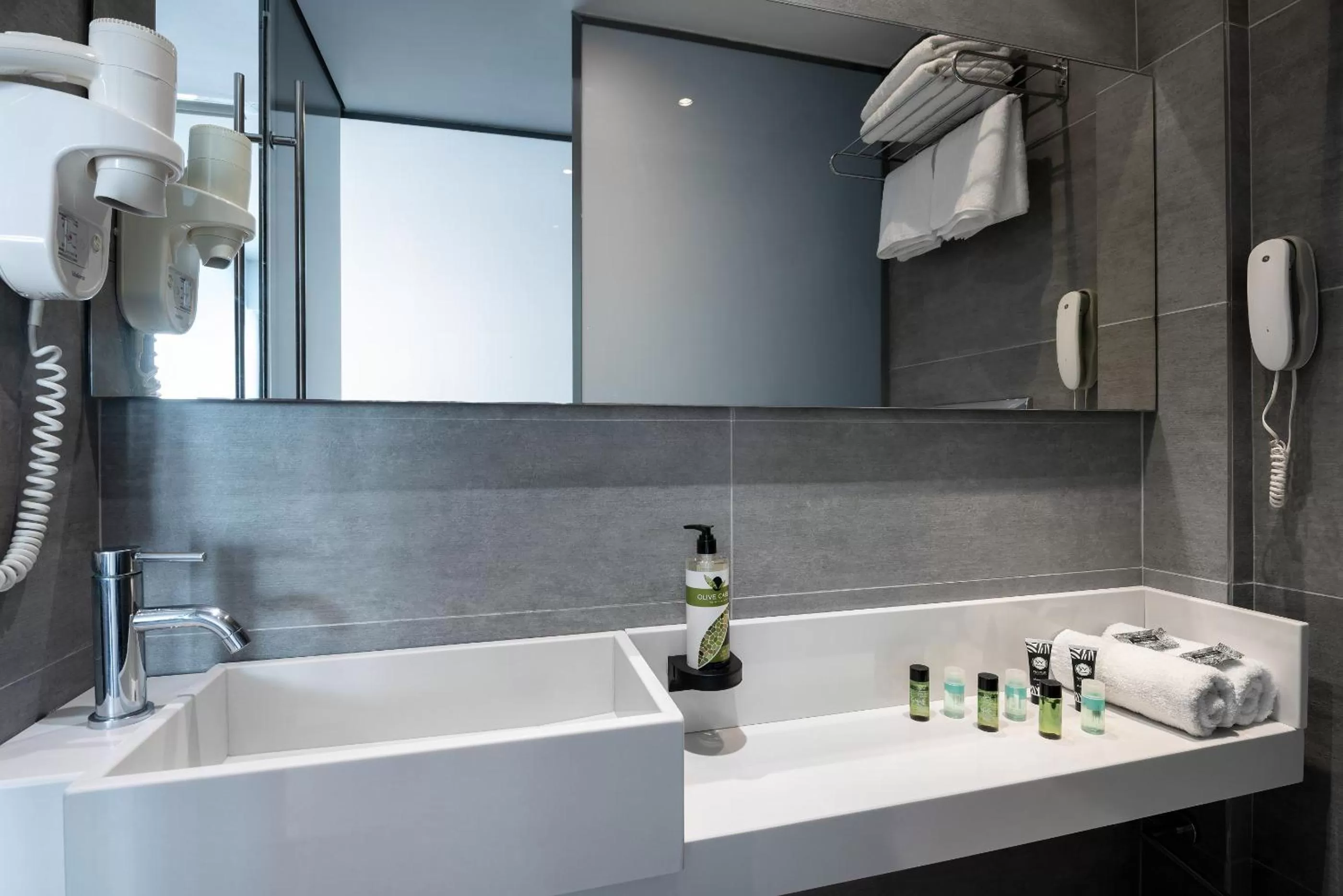 Bathroom in Oktober Downtown Boutique Hotel