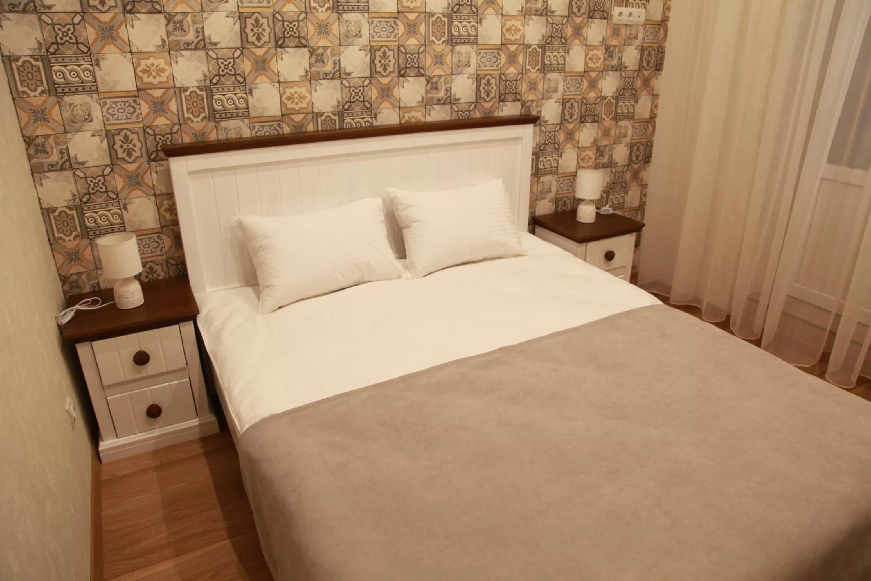 Bed in WINE & ROSE BOUTIQUE HOTEL